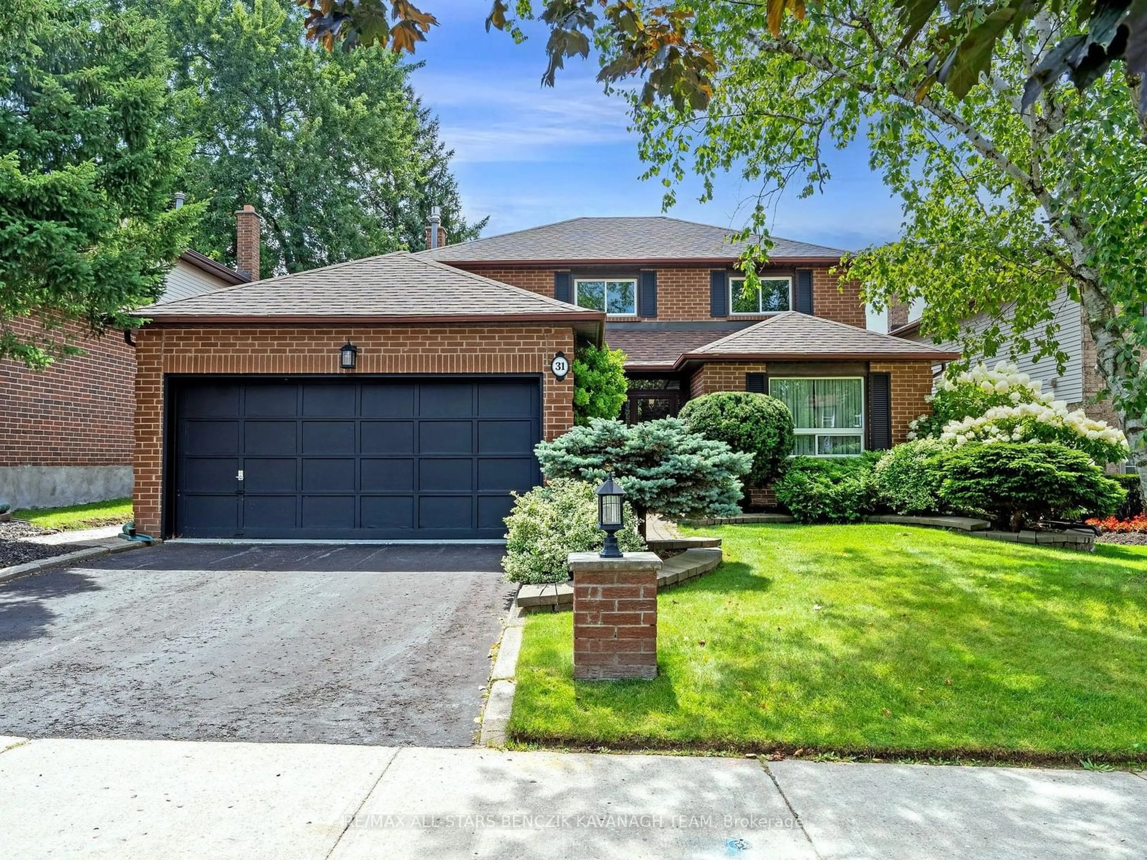 Home with brick exterior material, street for 31 Larkin Ave, Markham Ontario L3P 4P9