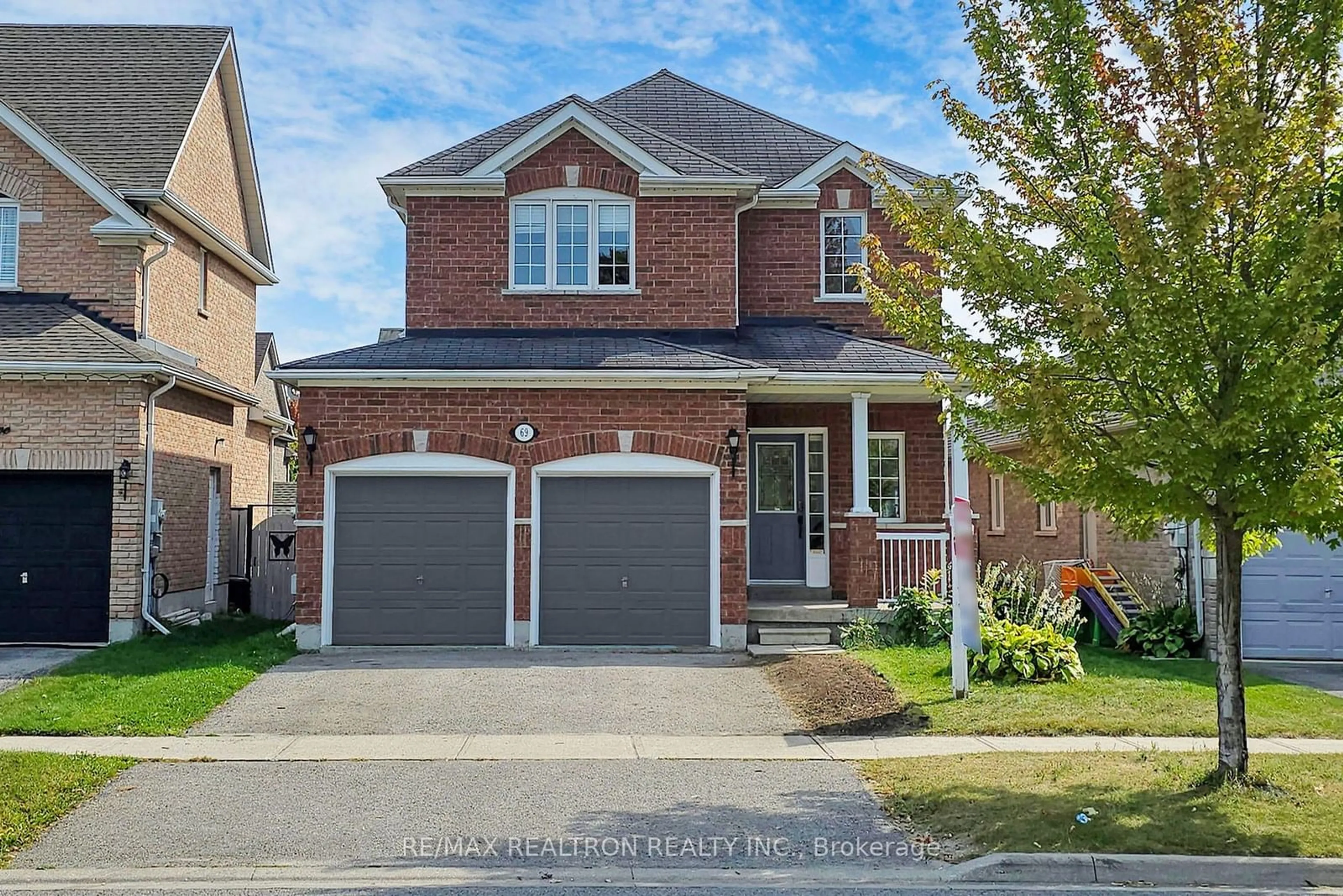 Home with brick exterior material, street for 69 Richmond Park Dr, Georgina Ontario L4P 0A4