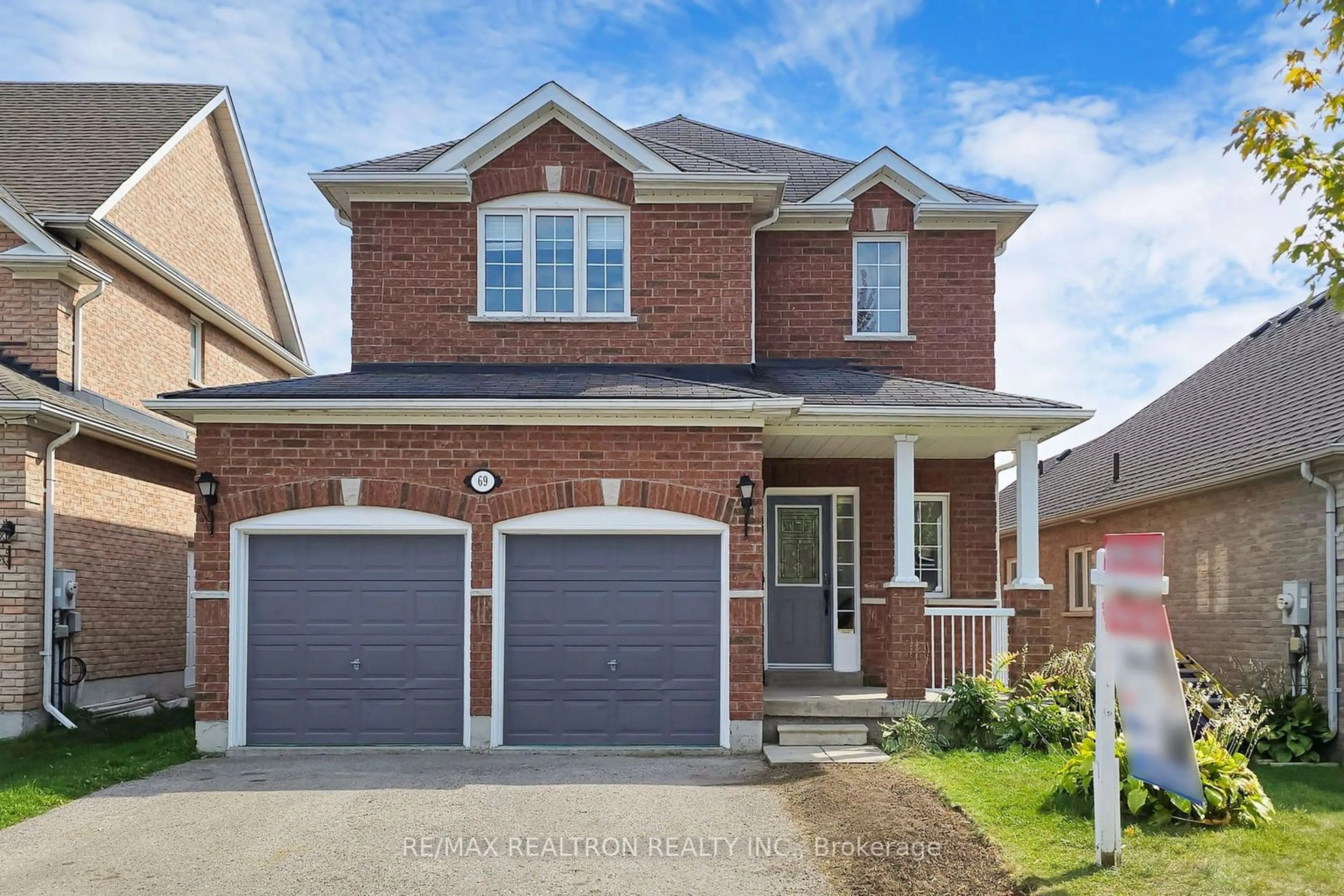 Home with brick exterior material, street for 69 Richmond Park Dr, Georgina Ontario L4P 0A4