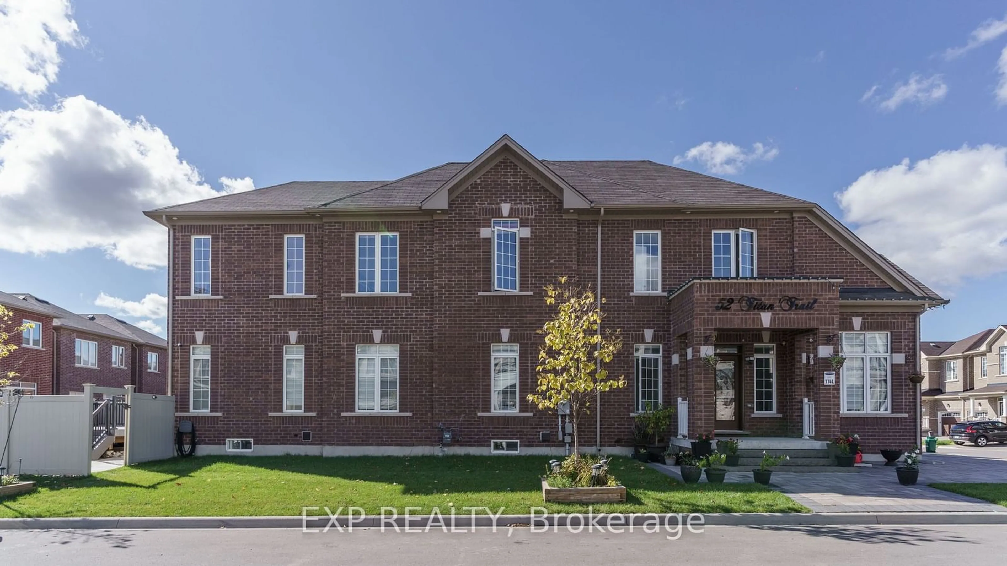 Home with brick exterior material, street for 52 Titan Tr, Markham Ontario L3S 0E2