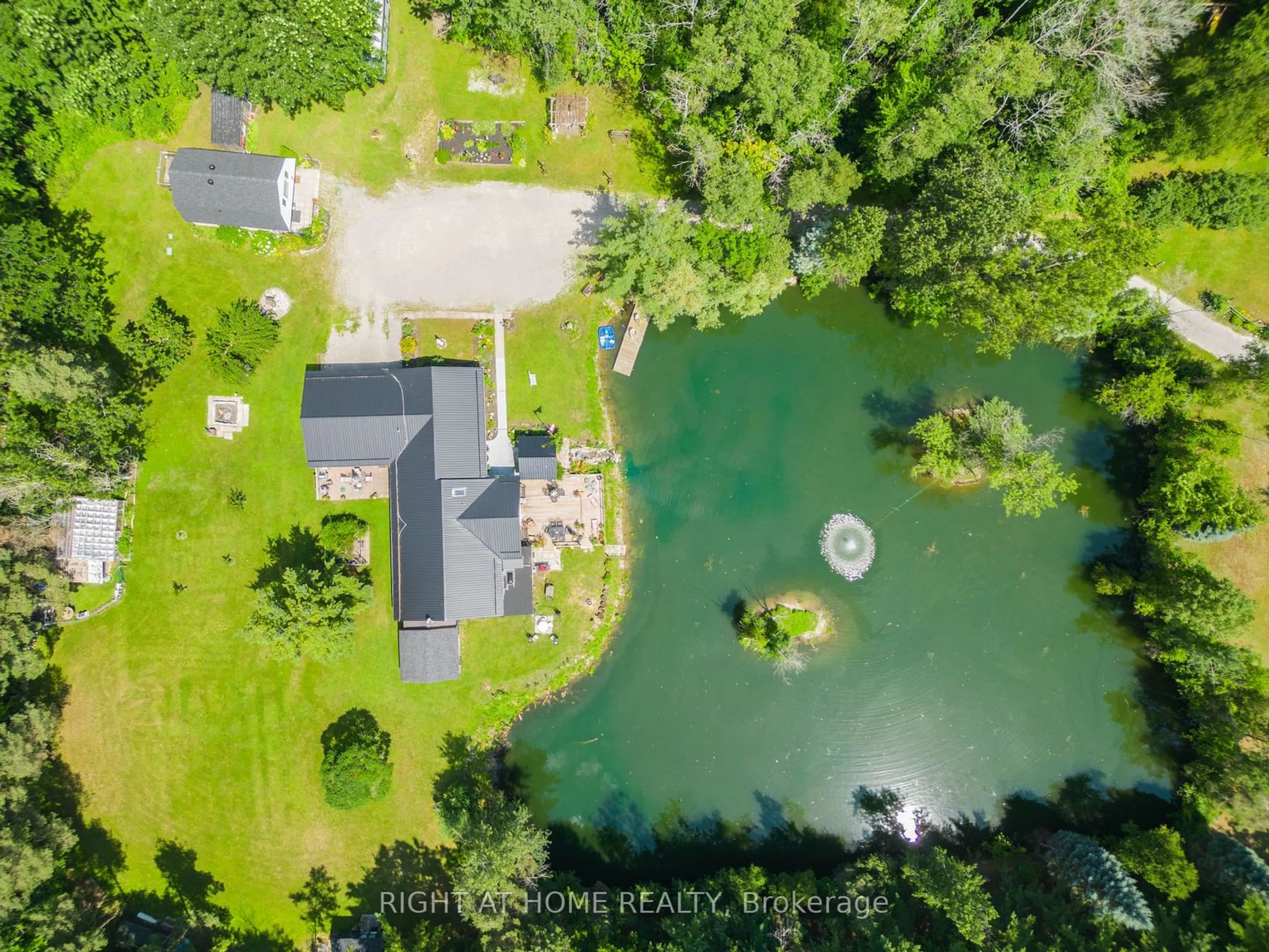 A pic from outside/outdoor area/front of a property/back of a property/a pic from drone, water/lake/river/ocean view for 1114 Goshen Rd, Innisfil Ontario L9S 2M5