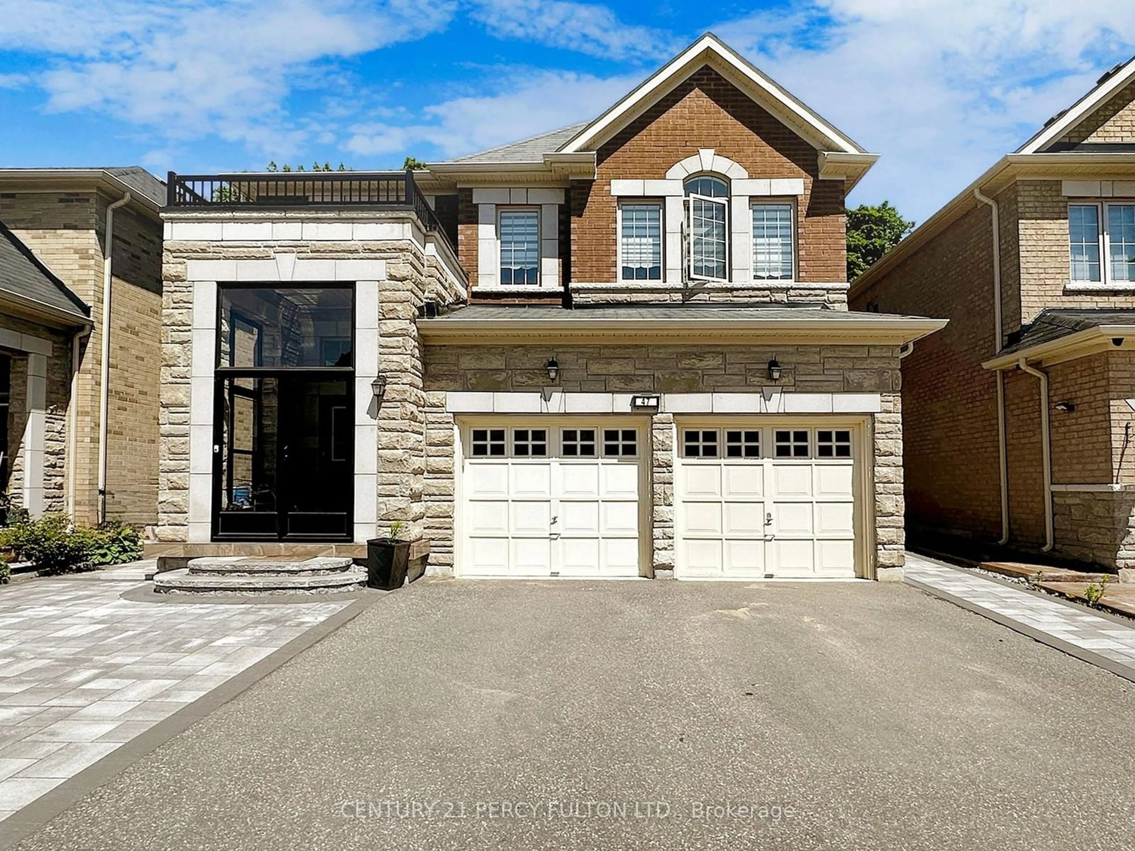 Home with brick exterior material, street for 47 Mohandas Dr, Markham Ontario L3S 0E5