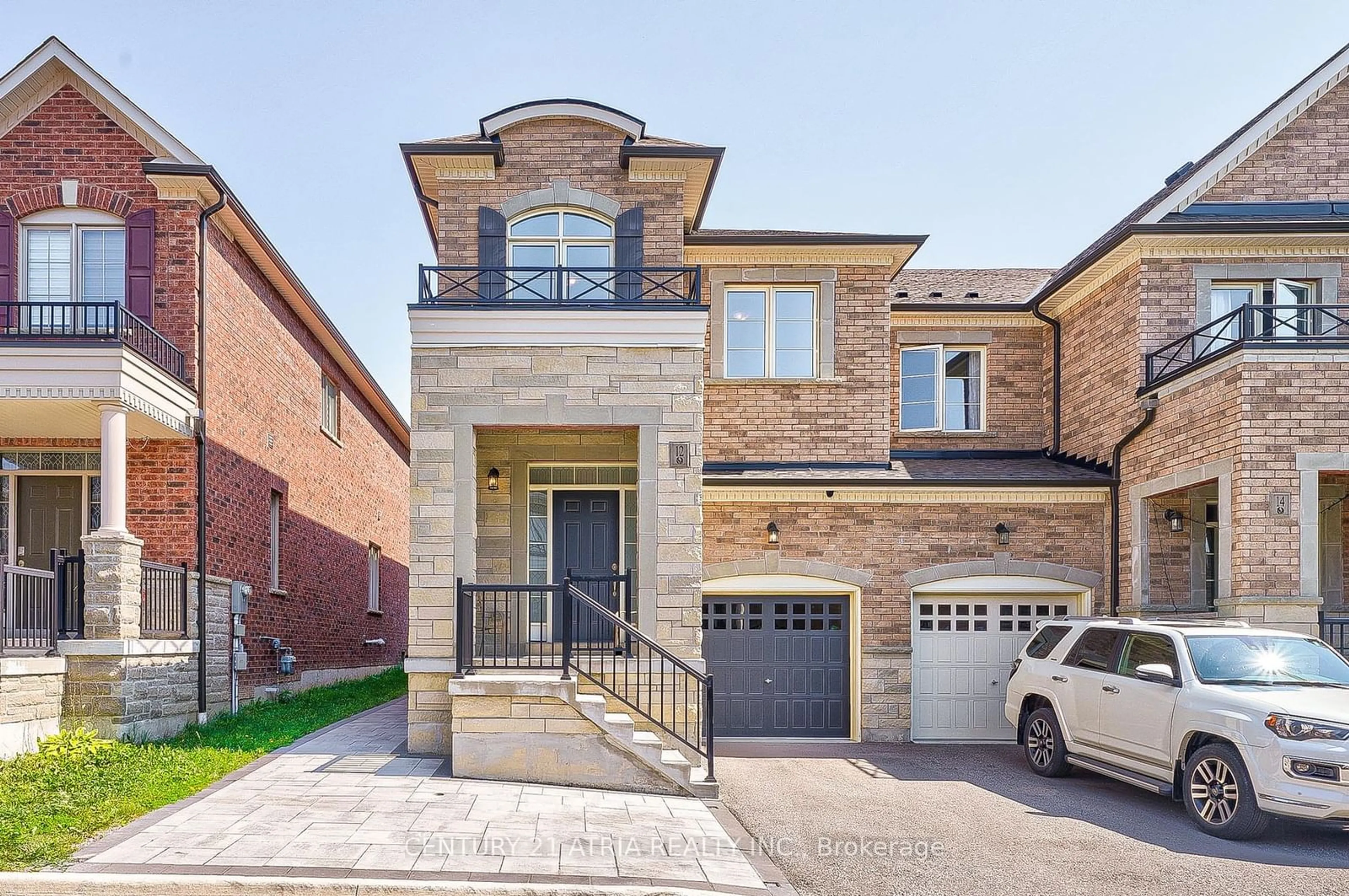 Home with brick exterior material, street for 12 Twinflower Lane, Richmond Hill Ontario L4E 1E7