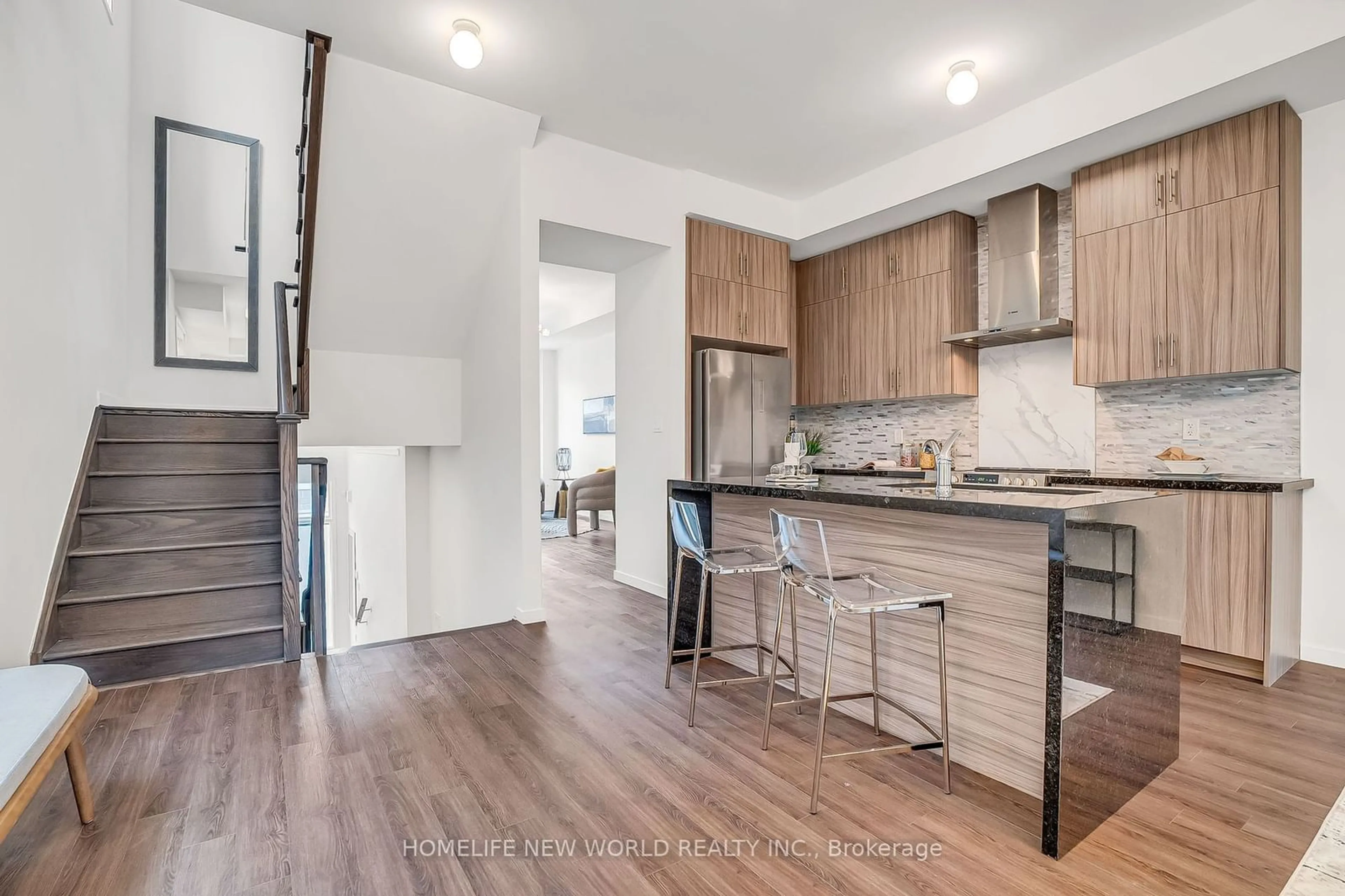 Open concept kitchen, wood/laminate floor for 55 Armillo Pl, Markham Ontario L6E 0V4