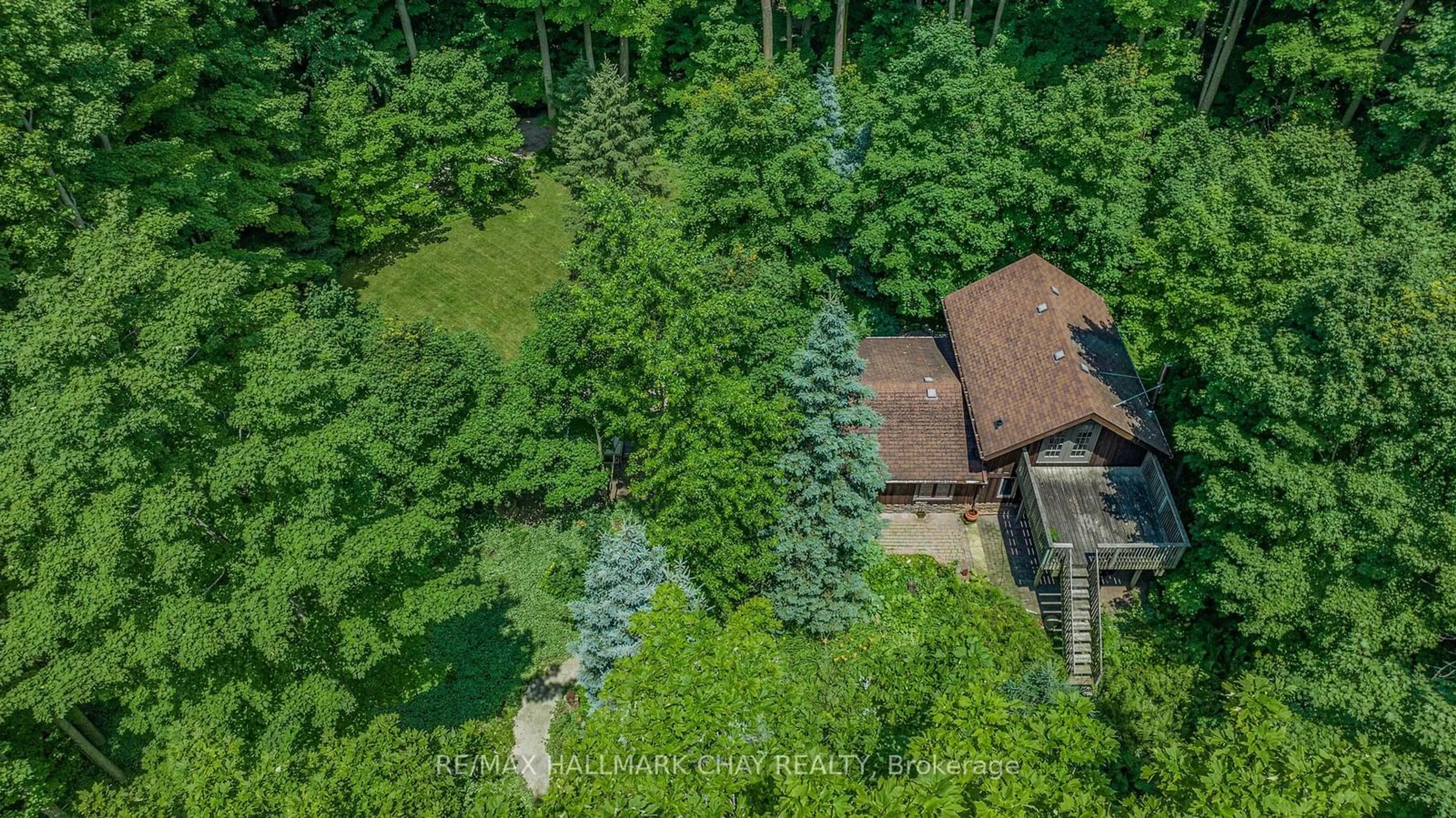 A pic from outside/outdoor area/front of a property/back of a property/a pic from drone, forest/trees view for 4507 10th Line, Bradford West Gwillimbury Ontario L0G 1A0