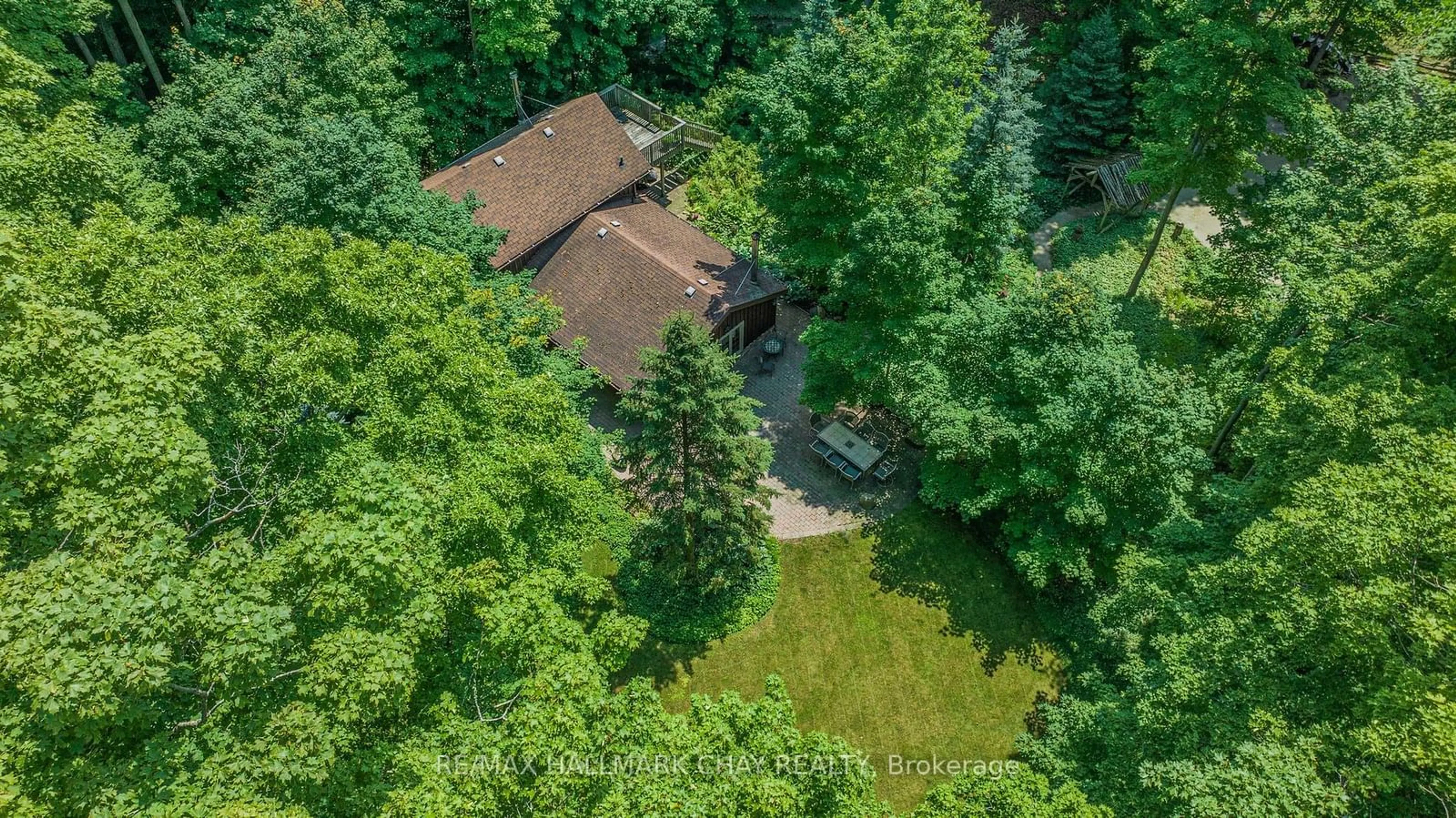 A pic from outside/outdoor area/front of a property/back of a property/a pic from drone, forest/trees view for 4507 10th Line, Bradford West Gwillimbury Ontario L0G 1A0