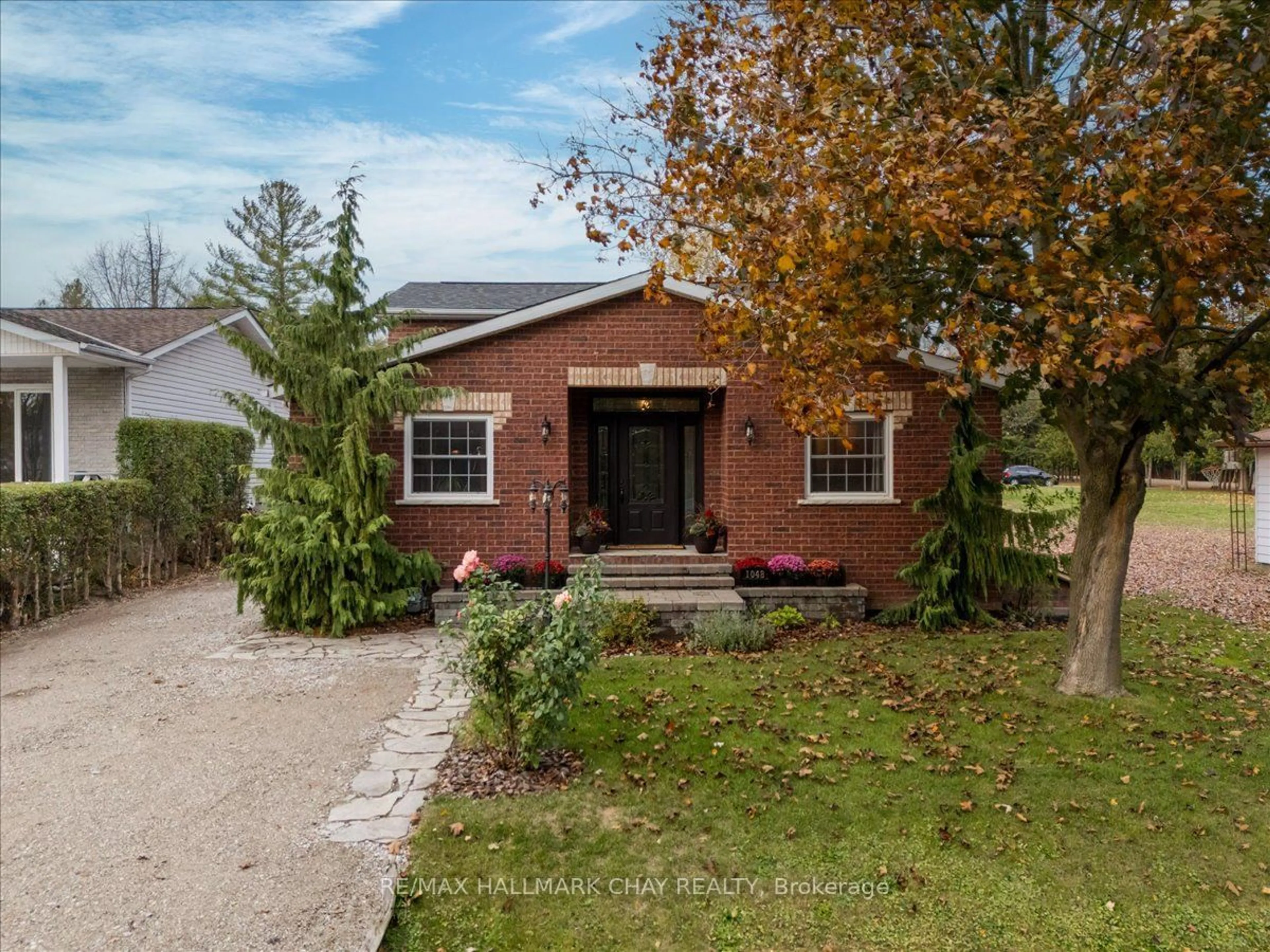 Home with brick exterior material, street for 1048 Fern Rd, Innisfil Ontario L0L 1C0