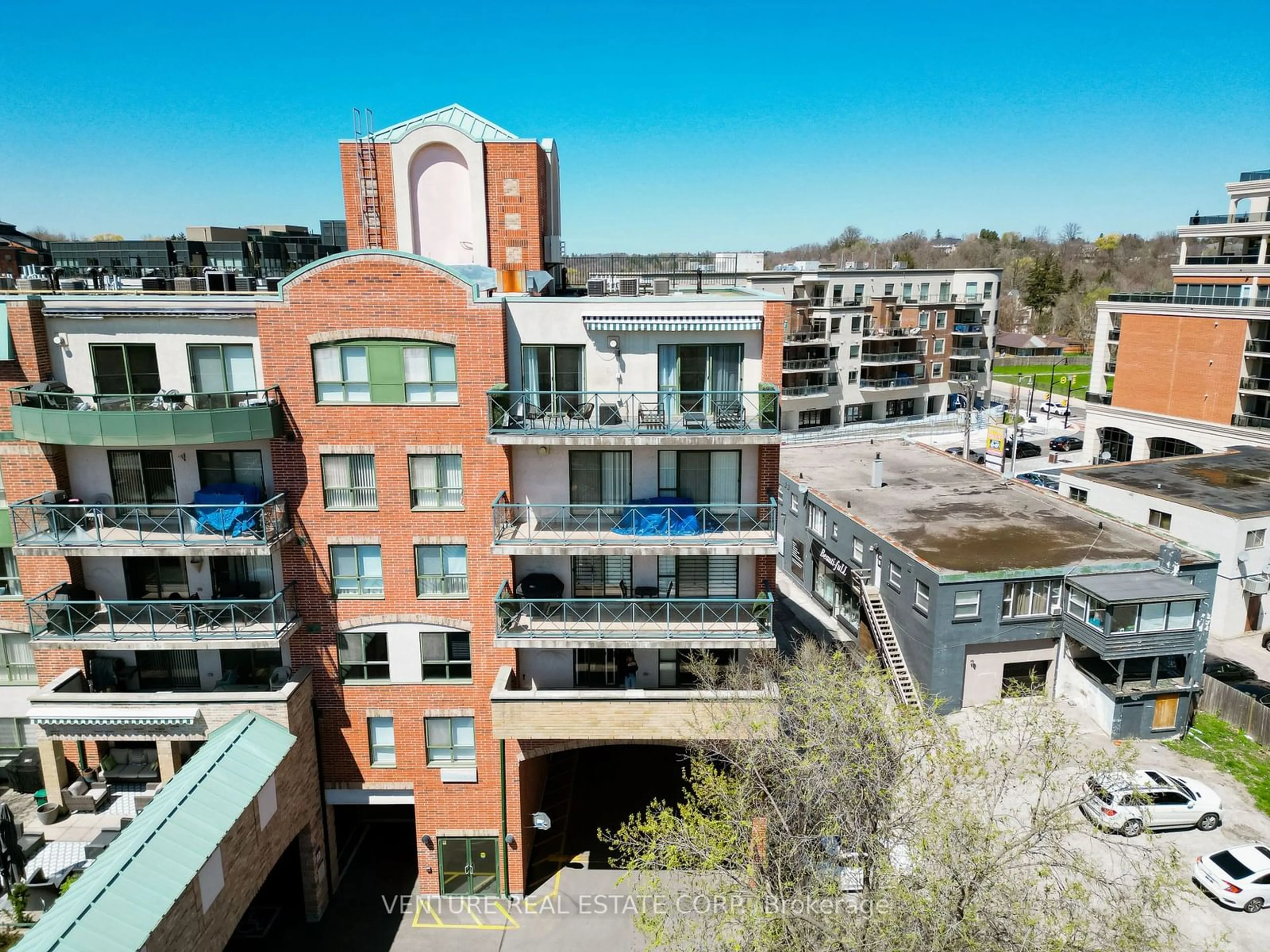 A pic from outside/outdoor area/front of a property/back of a property/a pic from drone, city buildings view from balcony for 121 Woodbridge Ave #312, Vaughan Ontario L4L 9E3