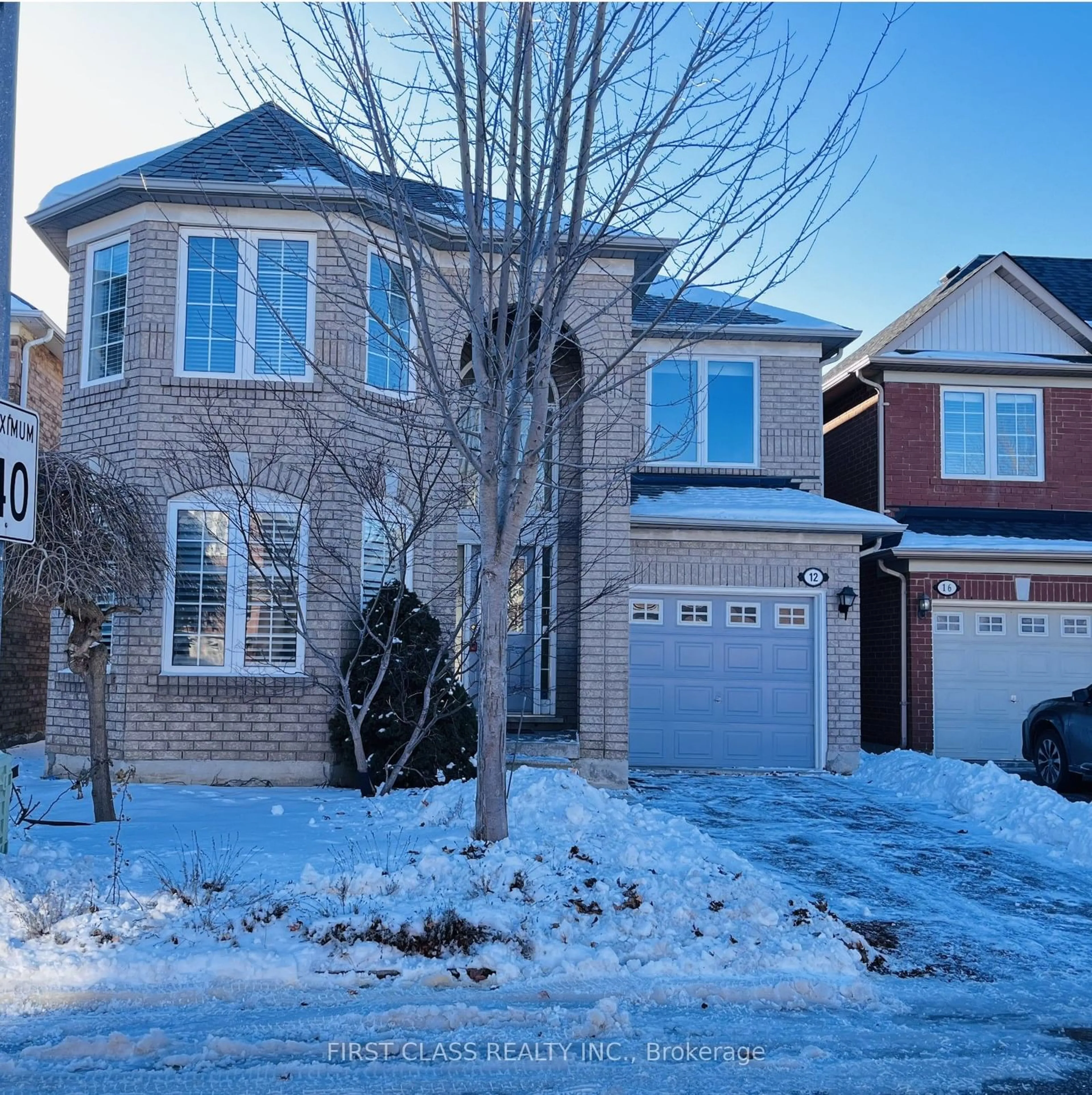 Home with brick exterior material, street for 12 Abbotsbury Lane, Markham Ontario L6C 2N2