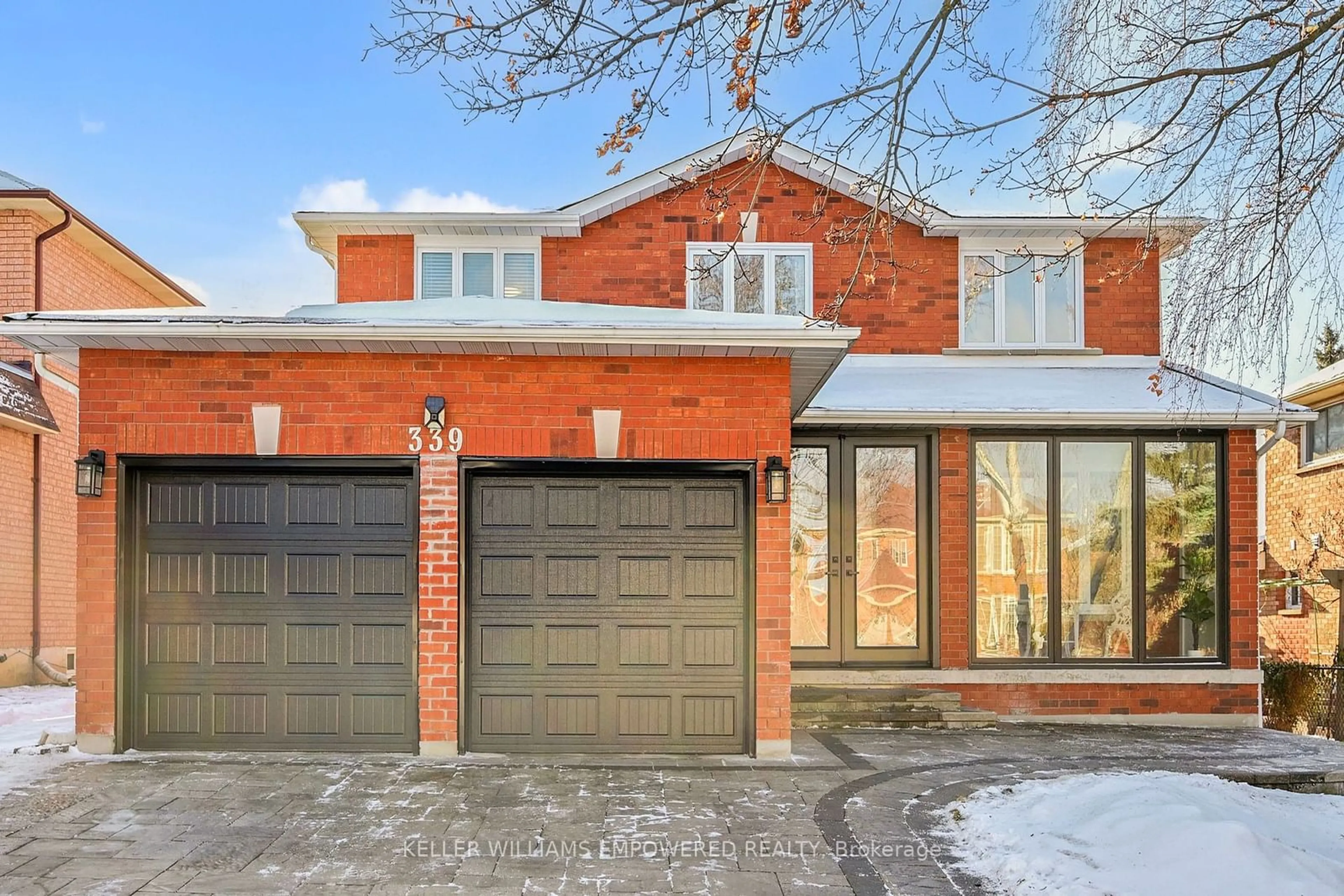 Home with brick exterior material, street for 339 Manhattan Dr, Markham Ontario L3P 7L7