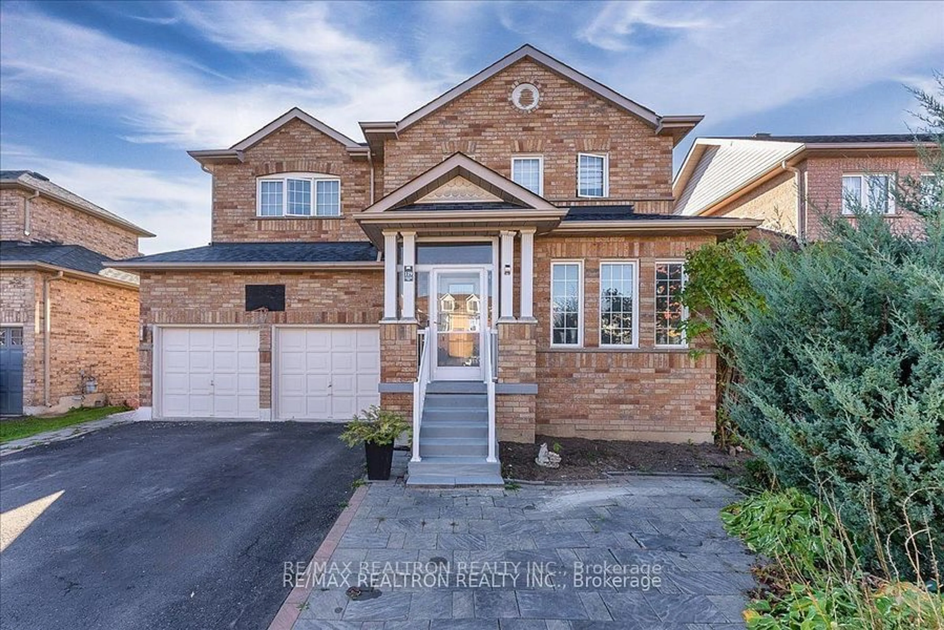 Home with brick exterior material, street for 129 Flagstone Way, Newmarket Ontario L3X 2Z8