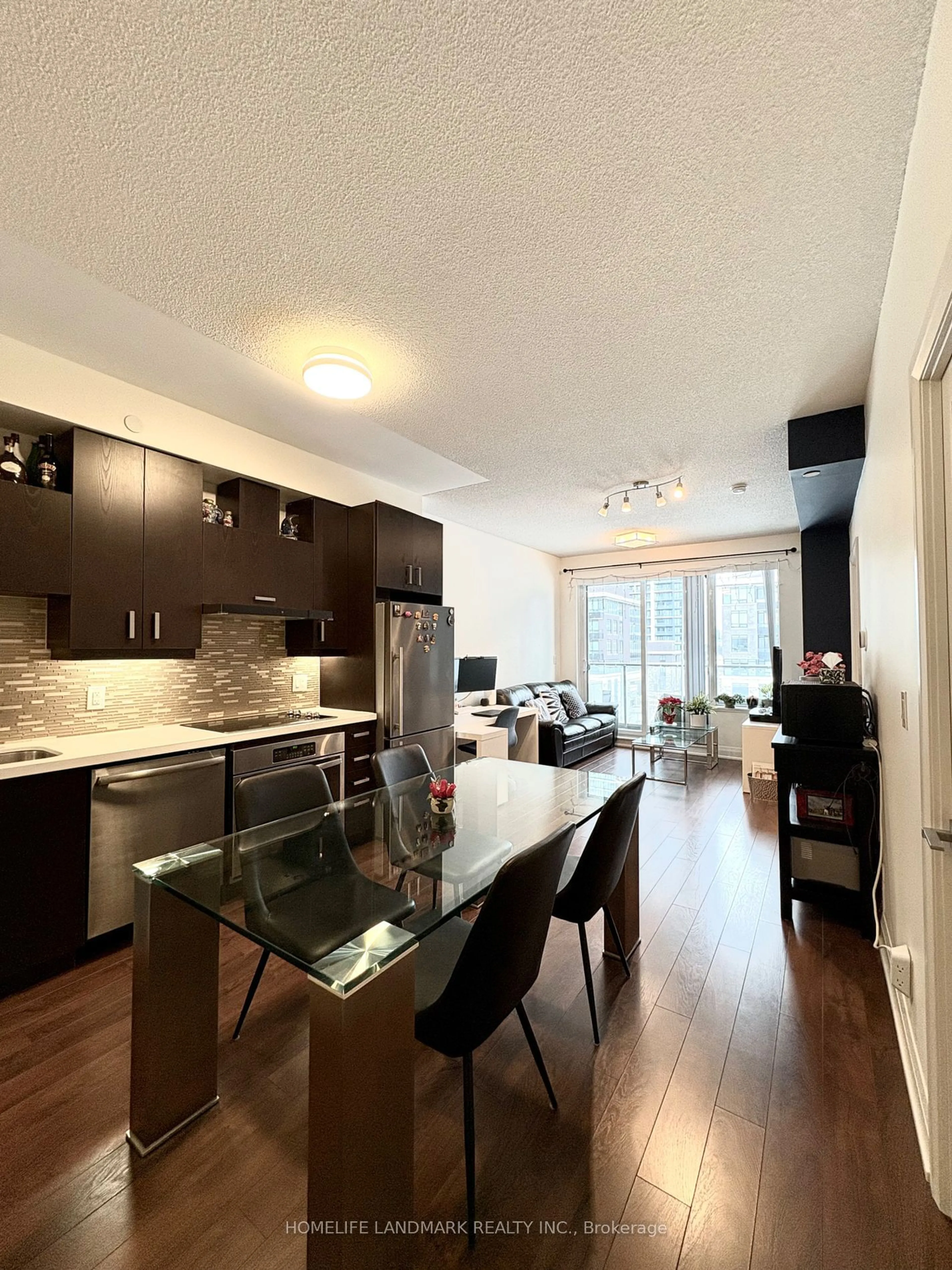 Open concept kitchen, wood/laminate floor for 28 Uptown Dr #506, Markham Ontario L3R 5M8