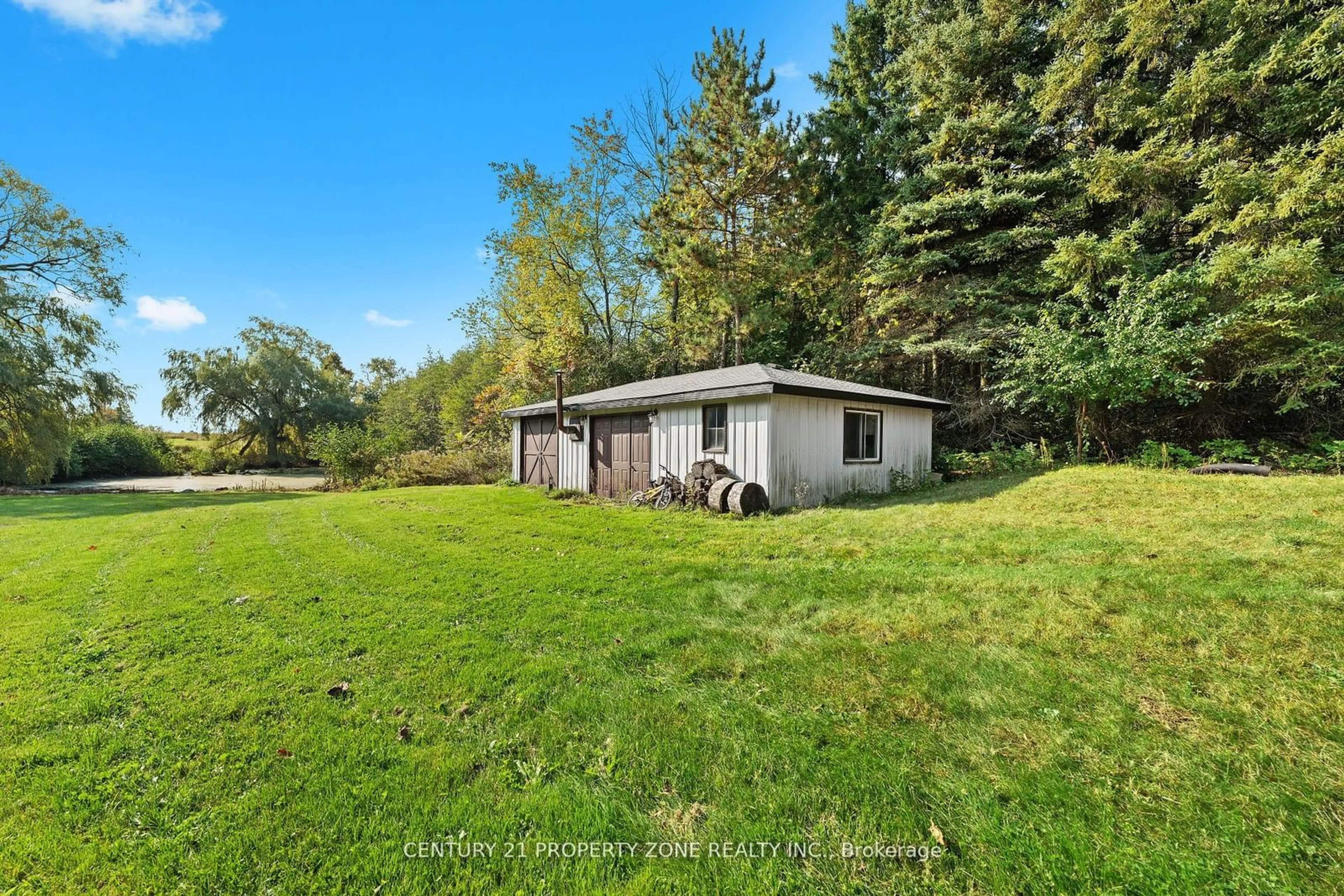 A pic from outside/outdoor area/front of a property/back of a property/a pic from drone, water/lake/river/ocean view for 3245 16th Side Rd, King Ontario L7B 1A3