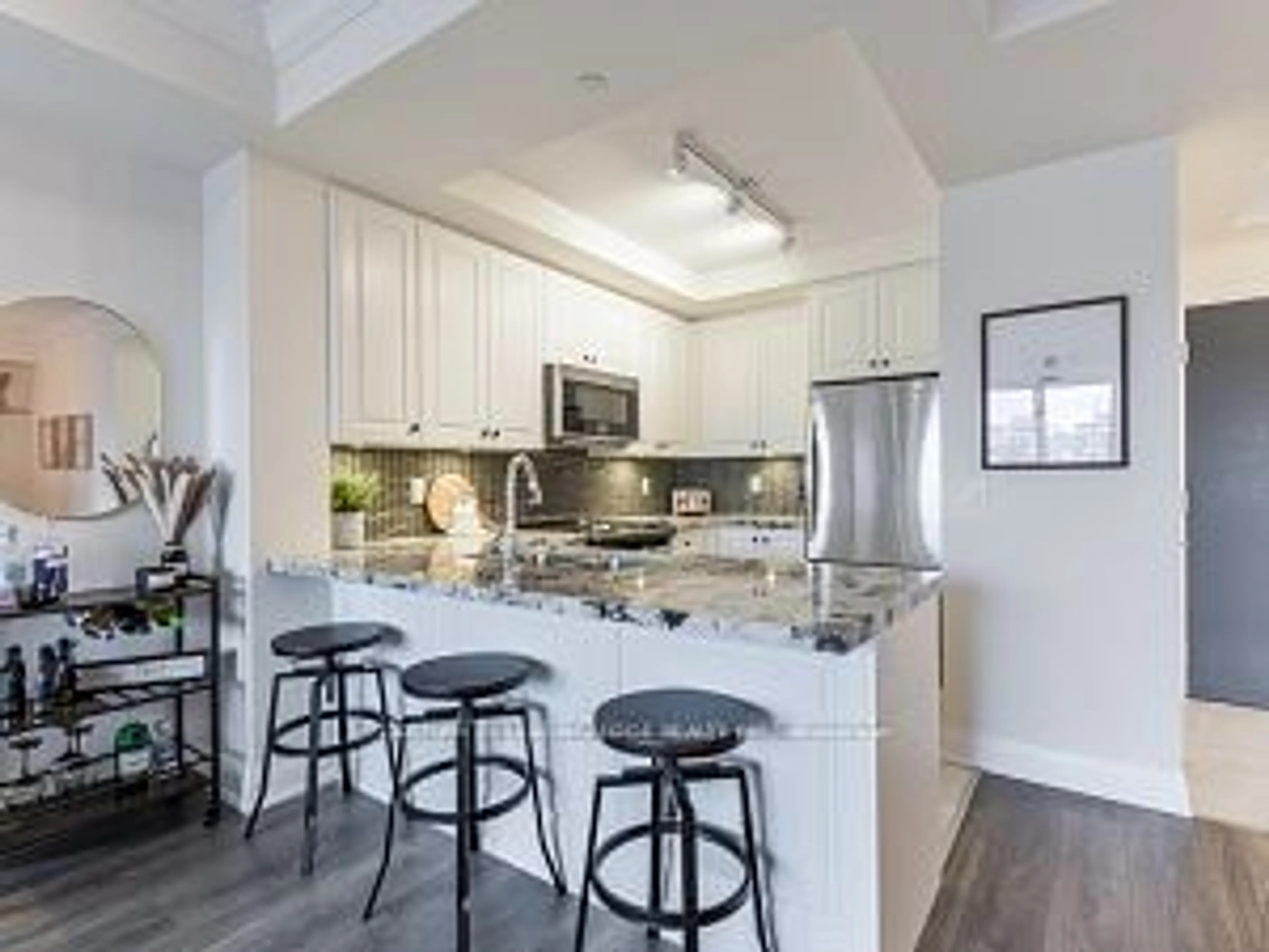 Open concept kitchen, unknown for 25 BAKER HILL Blvd #215, Whitchurch-Stouffville Ontario L4A 1P8