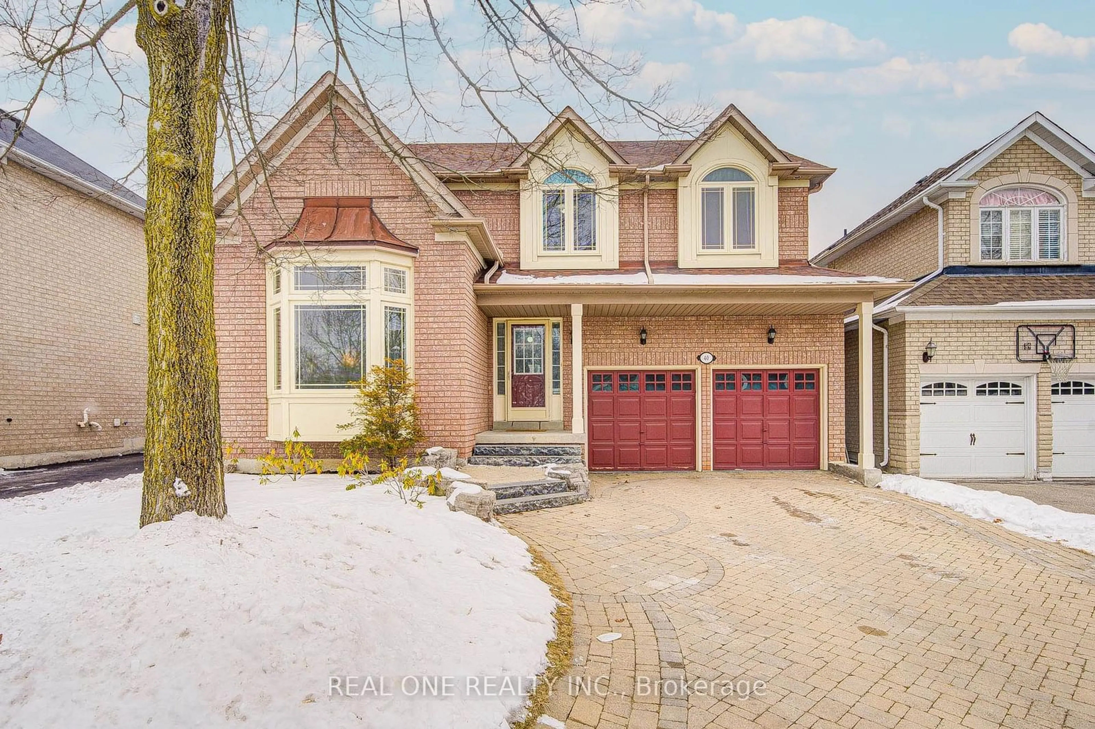 Home with brick exterior material, street for 40 Primrose Path Cres, Markham Ontario L3S 4A9