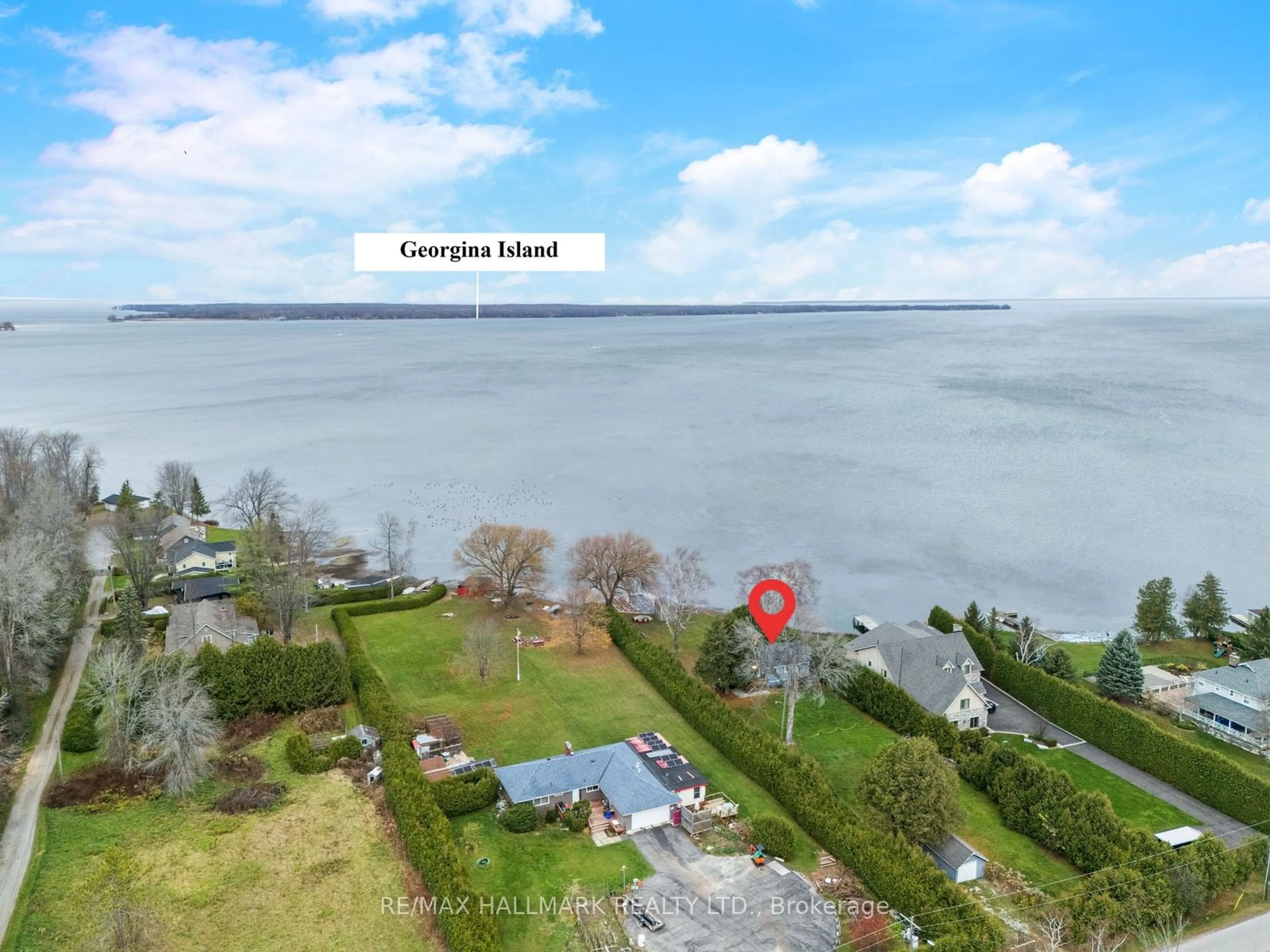 A pic from outside/outdoor area/front of a property/back of a property/a pic from drone, water/lake/river/ocean view for 7674 Black River Rd, Georgina Ontario L0E 1R0