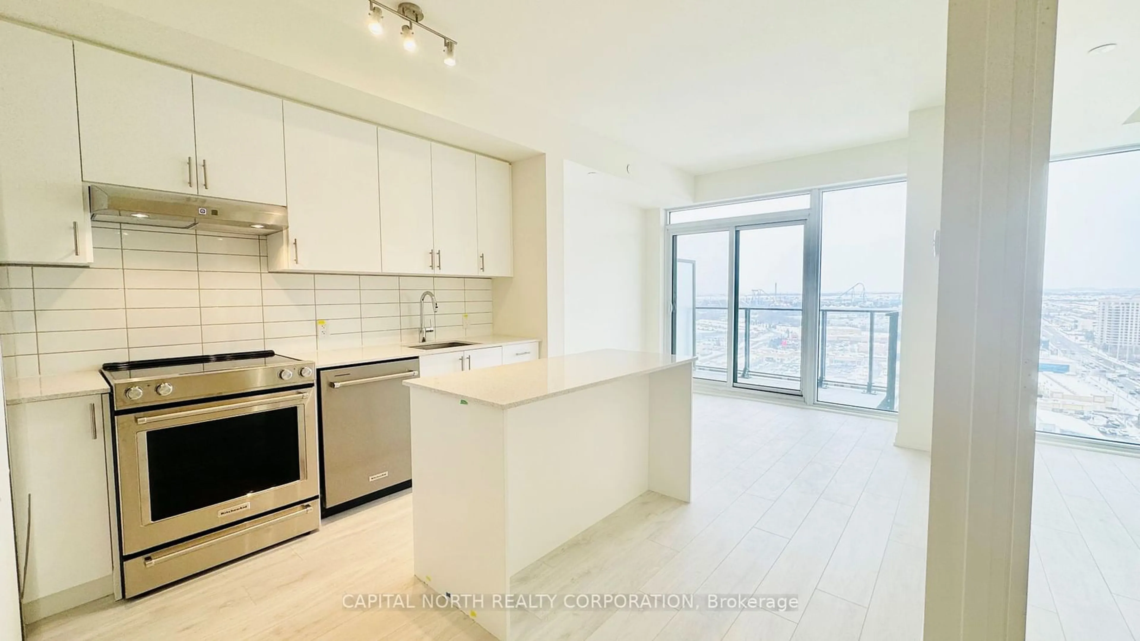 Open concept kitchen, ceramic/tile floor for 9000 Jane St #2022, Vaughan Ontario L4K 2M9