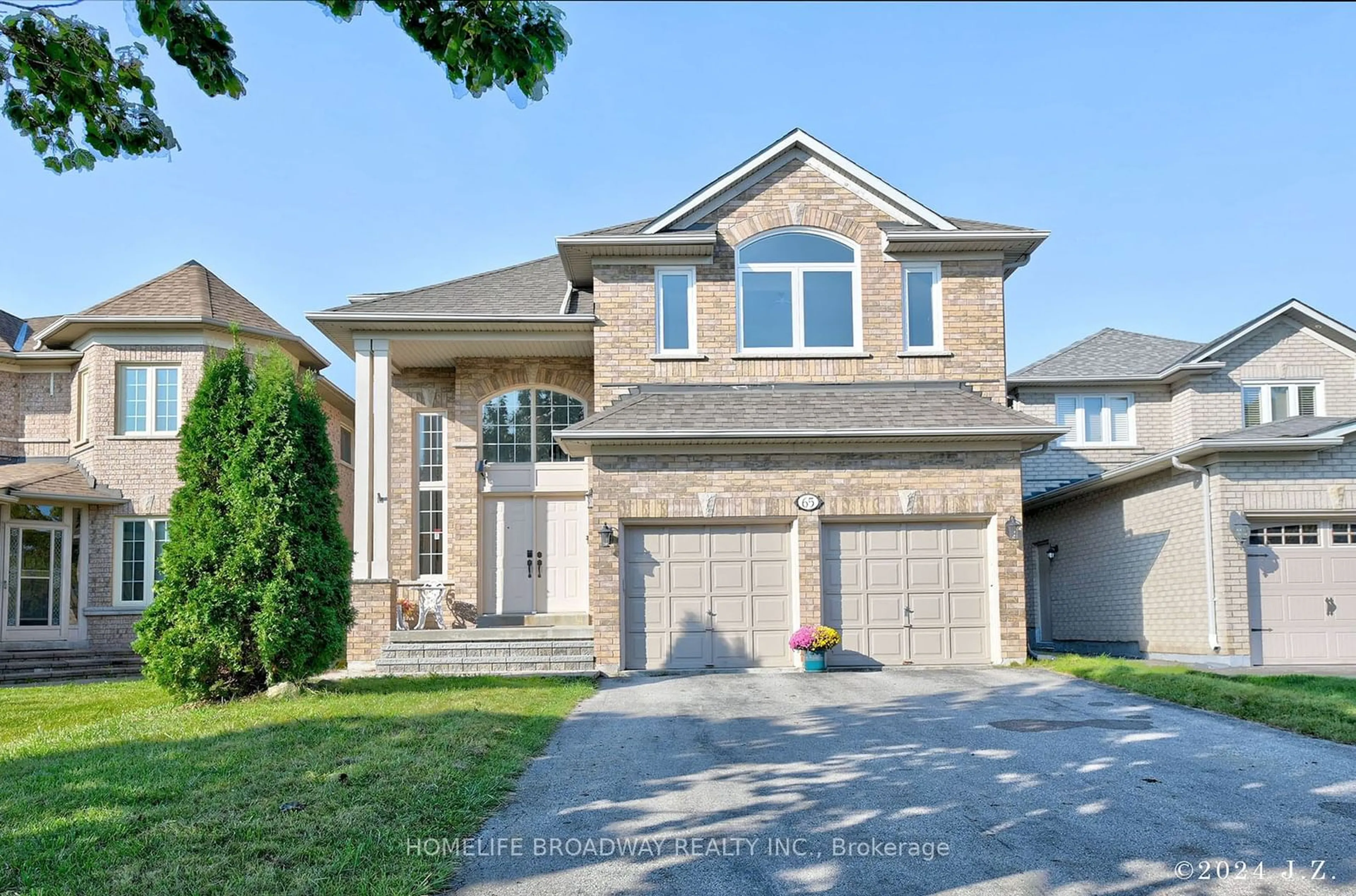 Home with brick exterior material, street for 65 Grandlea Cres, Markham Ontario L3S 4A2