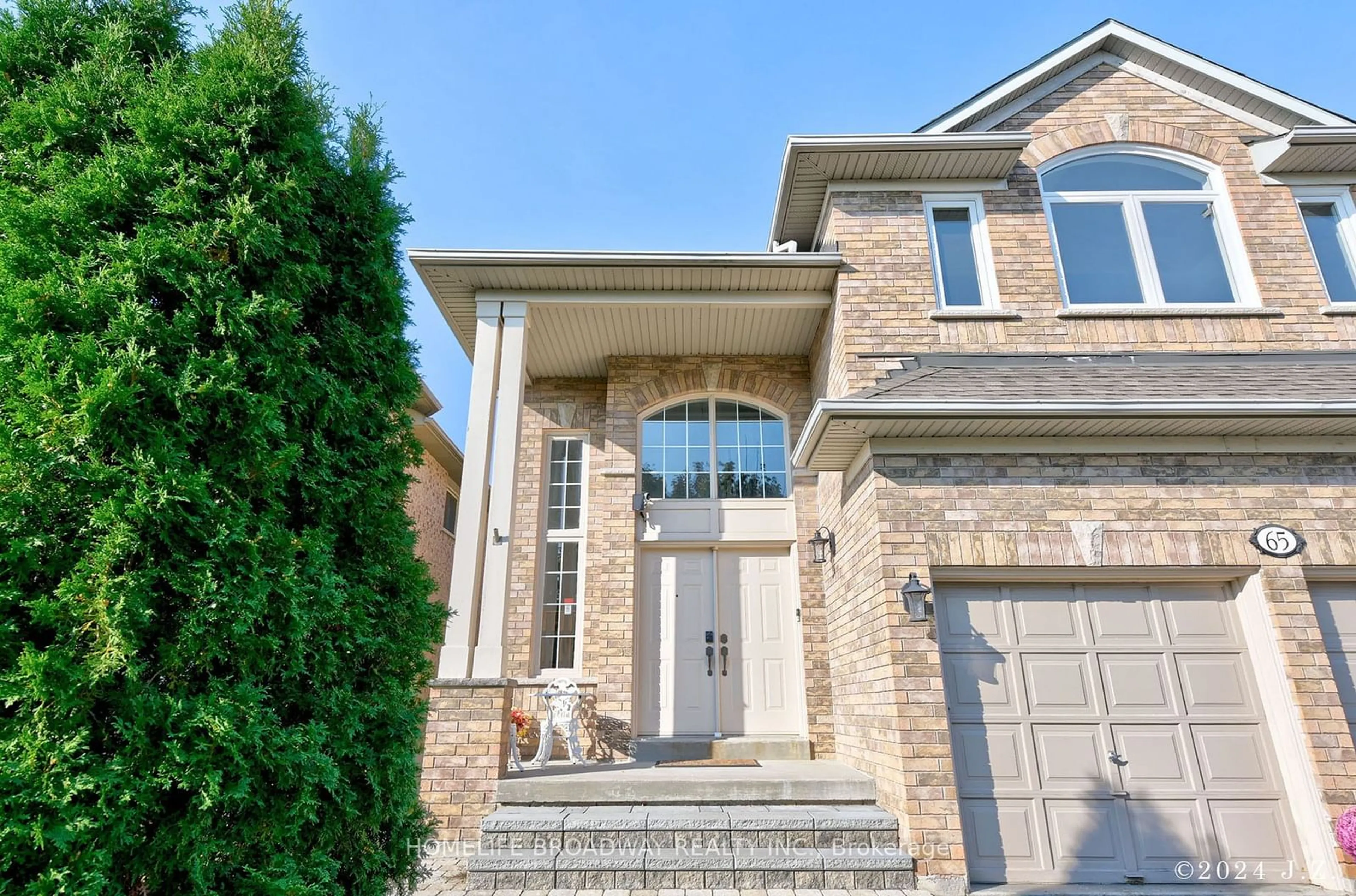 Home with brick exterior material, street for 65 Grandlea Cres, Markham Ontario L3S 4A2