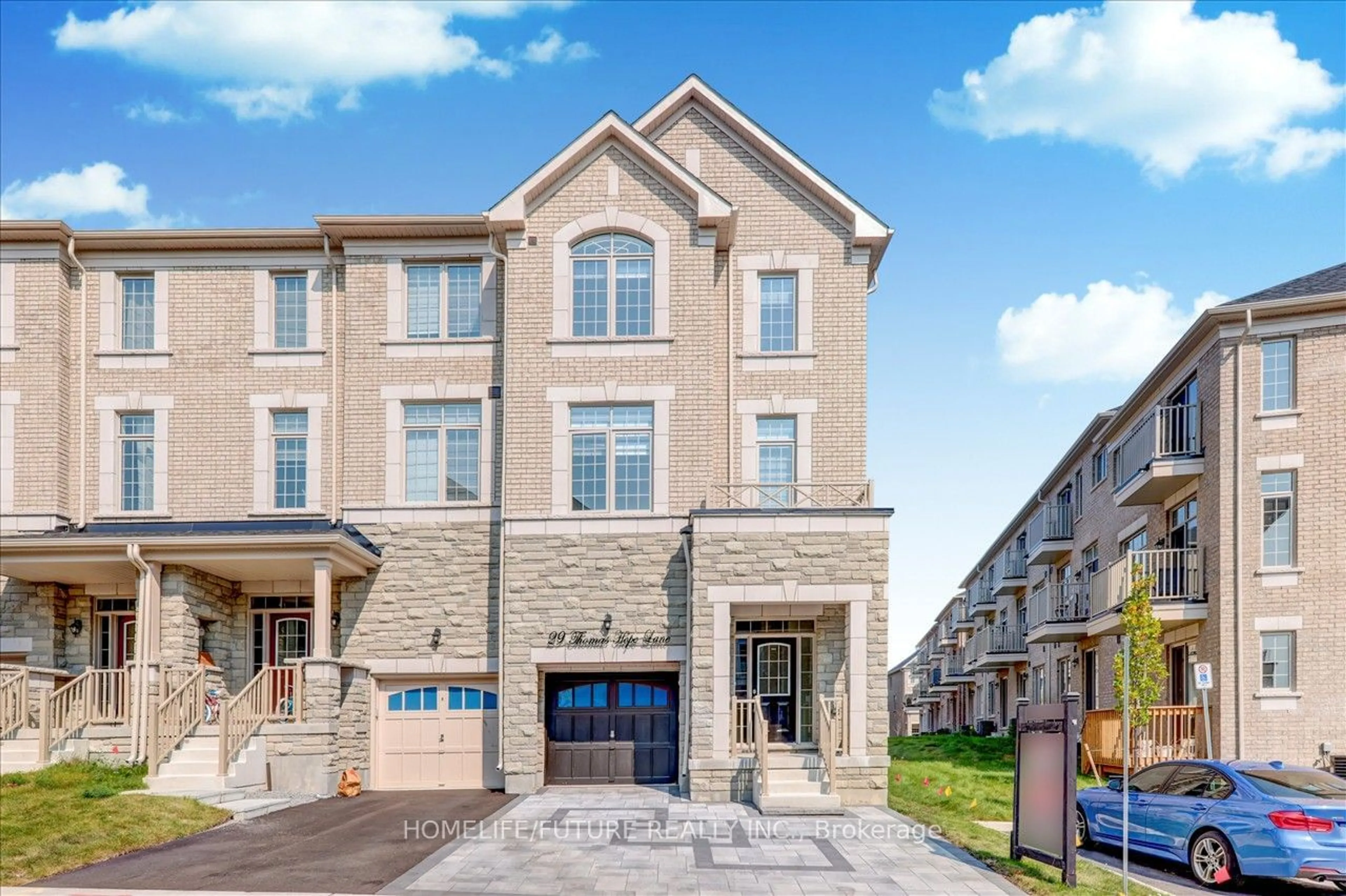 Home with brick exterior material, street for 29 Thomas Hope Lane, Markham Ontario L3S 0E9