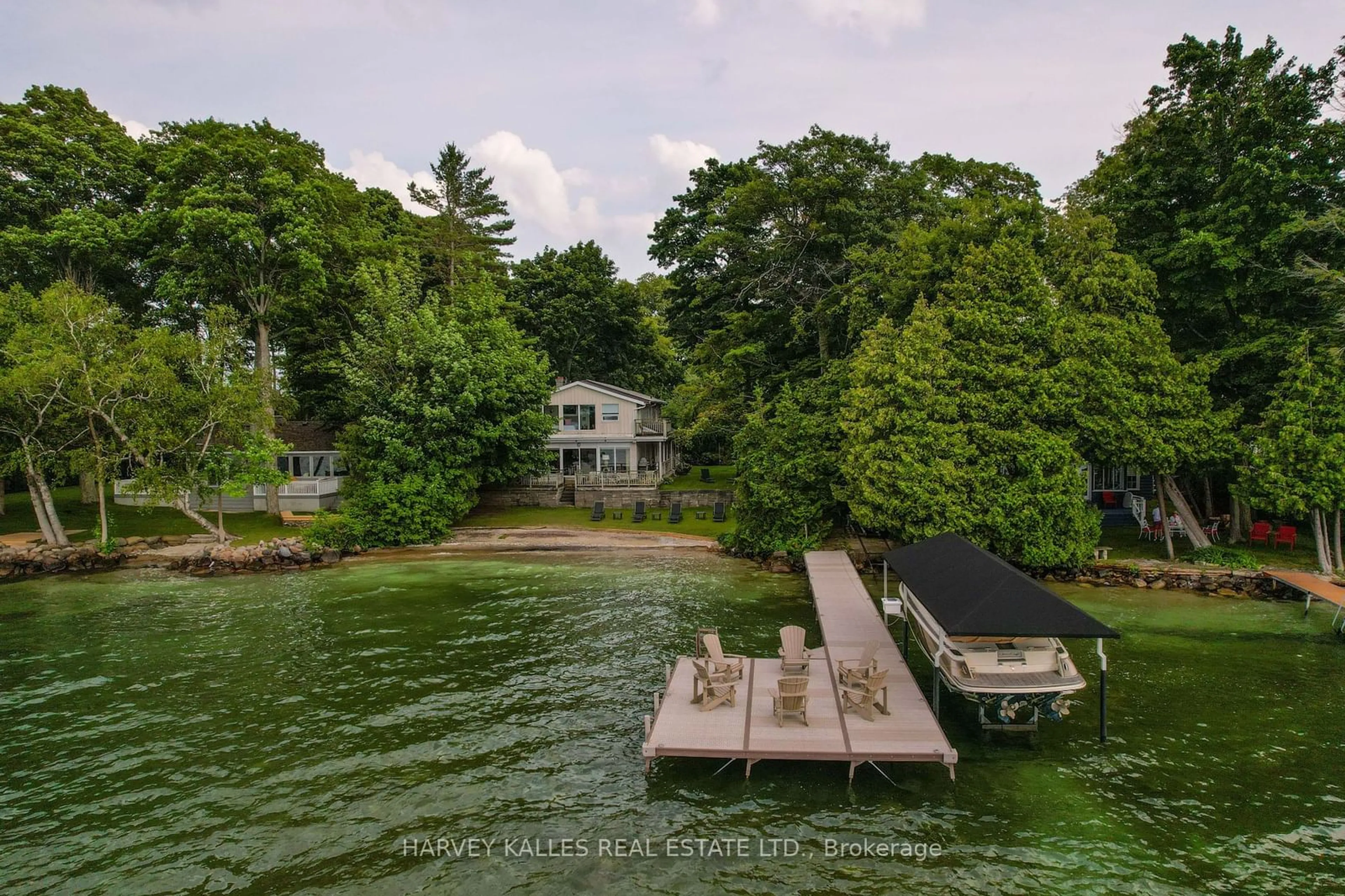 A pic from outside/outdoor area/front of a property/back of a property/a pic from drone, water/lake/river/ocean view for 22 Gooch Park Dr, Innisfil Ontario L9S 2S6