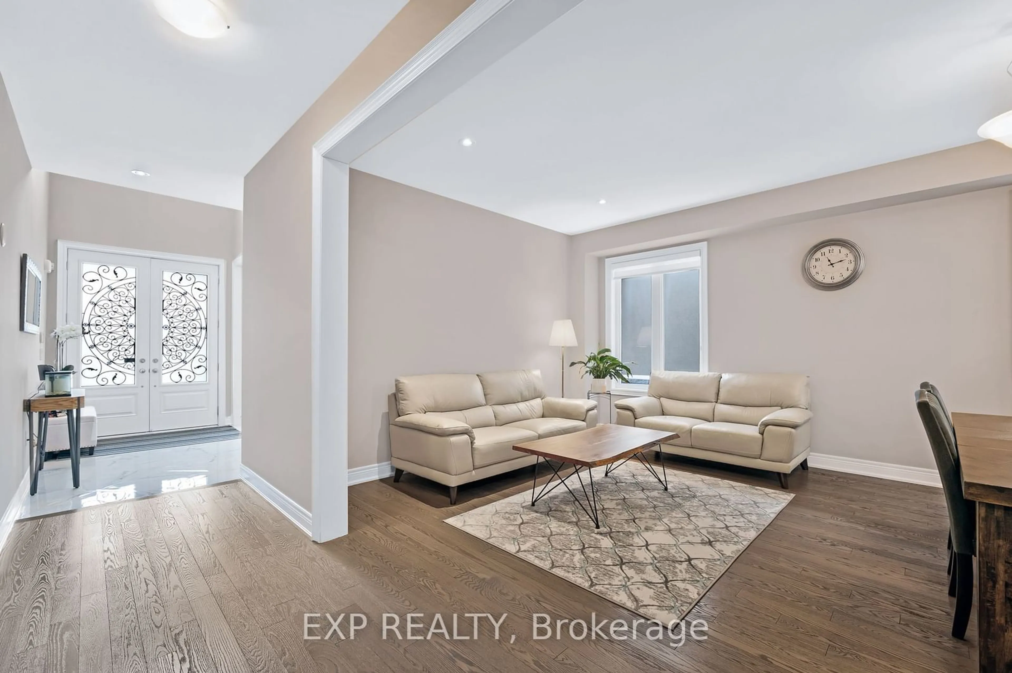 Living room with furniture, ceramic/tile floor for 58 Clifford Fairbarn Dr, East Gwillimbury Ontario L9N 0S1