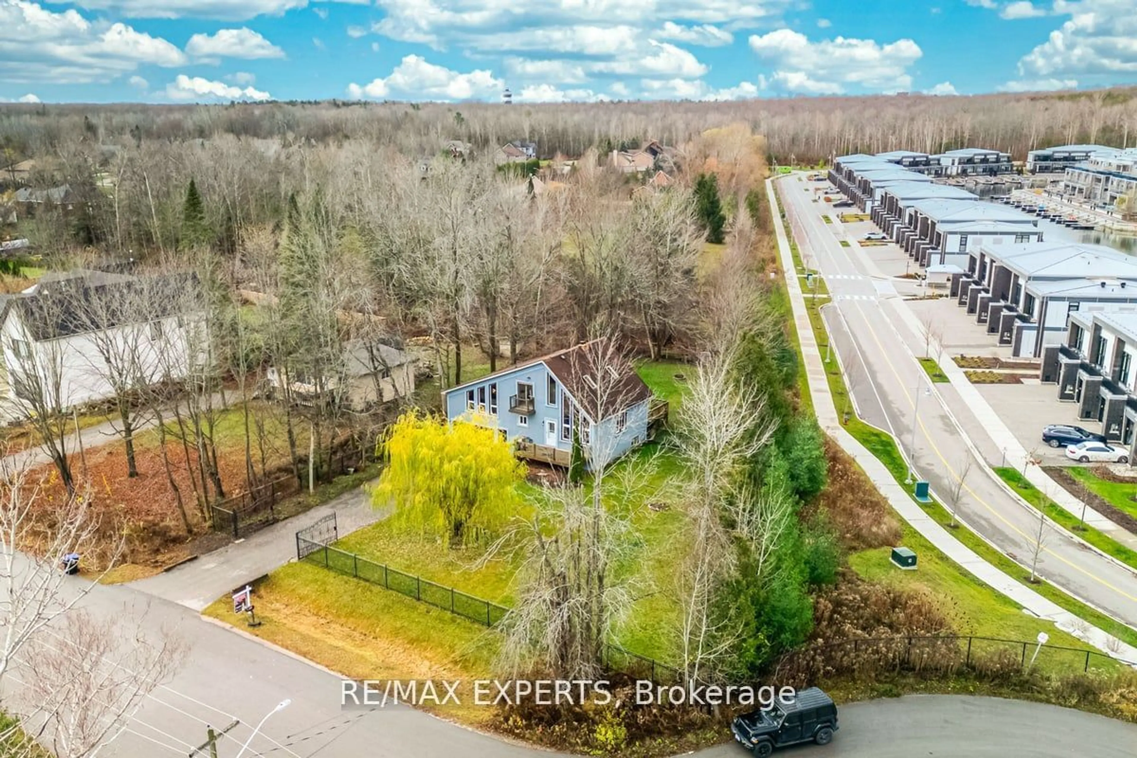 A pic from outside/outdoor area/front of a property/back of a property/a pic from drone, street for 3716 Maple Grove Rd, Innisfil Ontario L9S 3B3