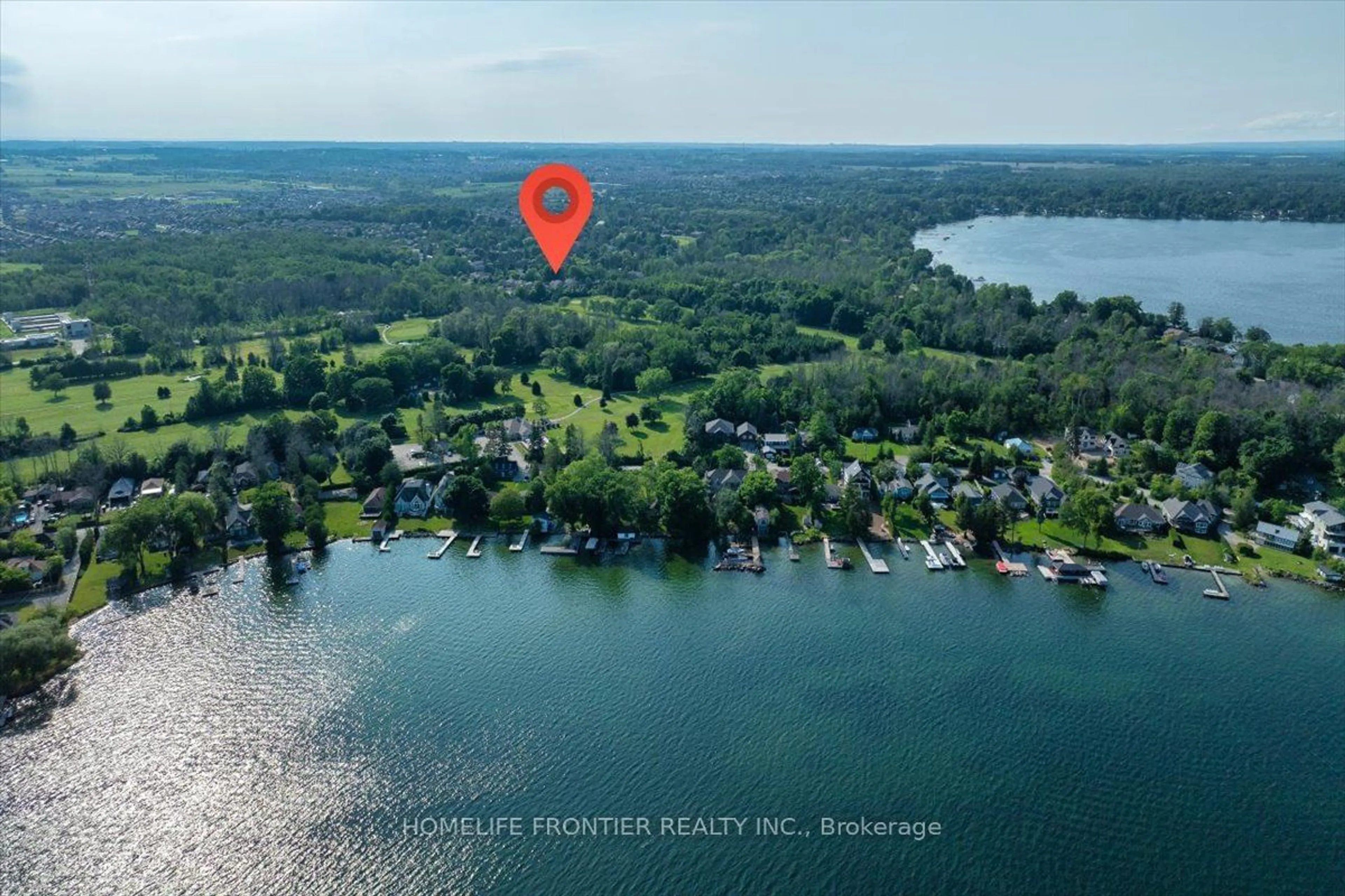 A pic from outside/outdoor area/front of a property/back of a property/a pic from drone, water/lake/river/ocean view for 1664 Moyer Ave, Innisfil Ontario L9S 1S8