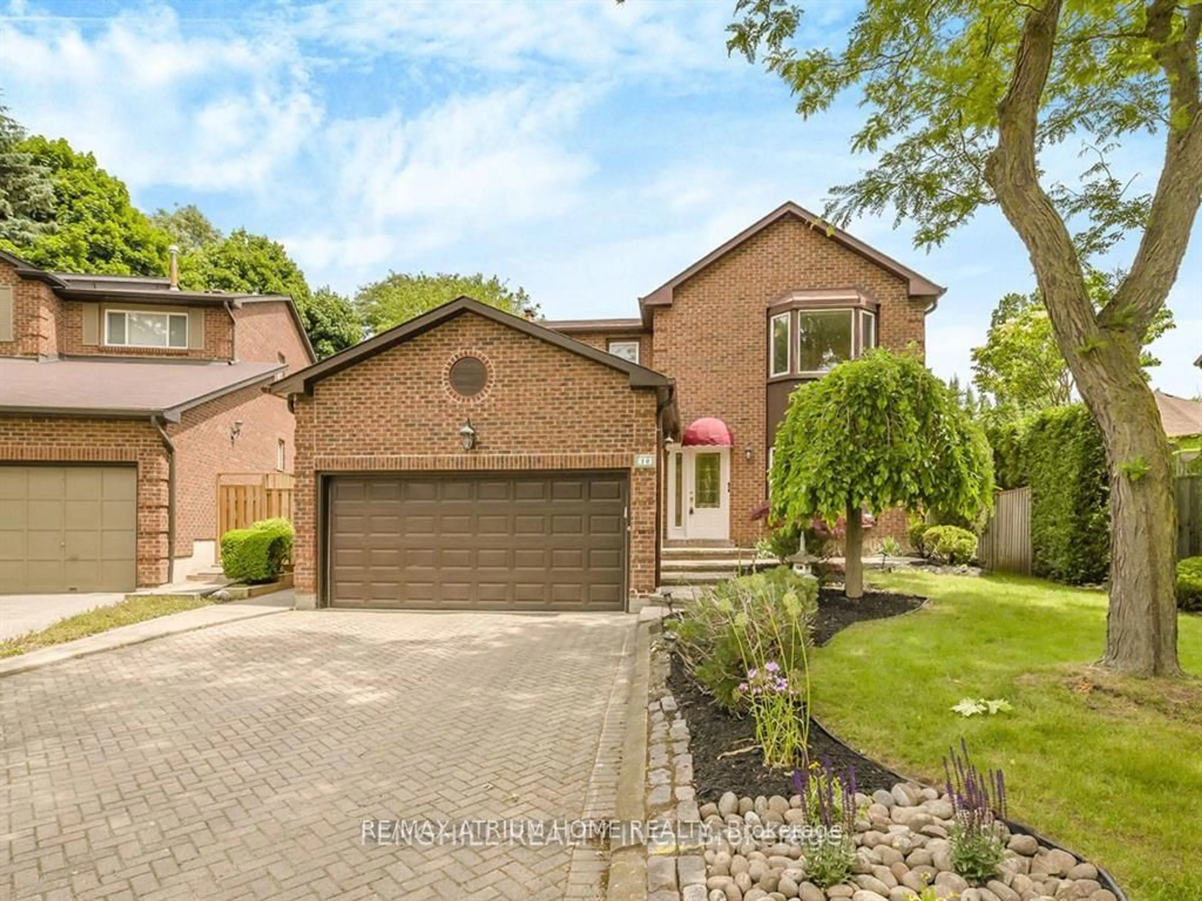 Home with brick exterior material, street for 10 Spanhouse Cres, Markham Ontario L3R 4E3