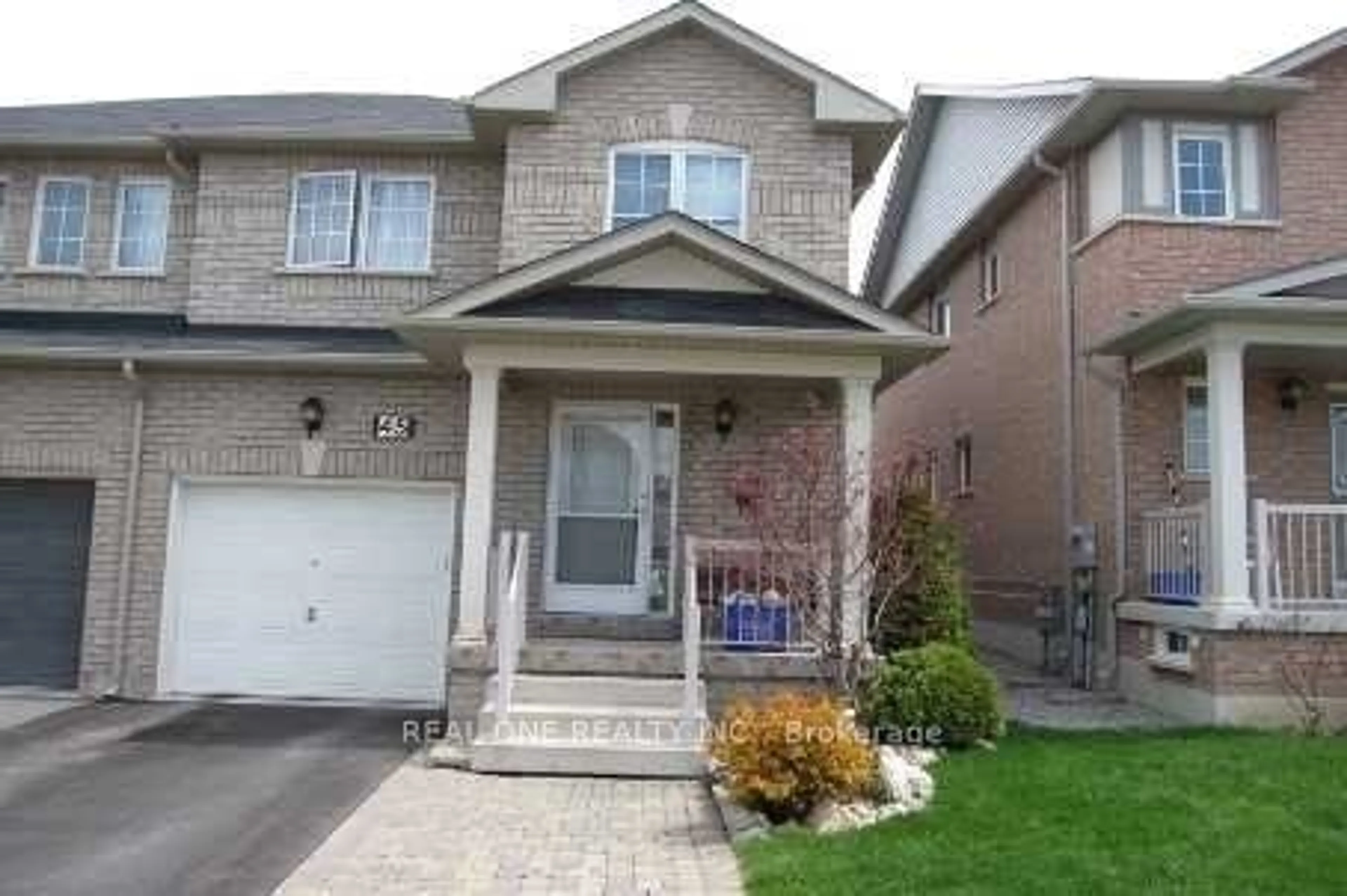 Home with brick exterior material, street for 45 Devonwood Dr, Markham Ontario L6C 3A7