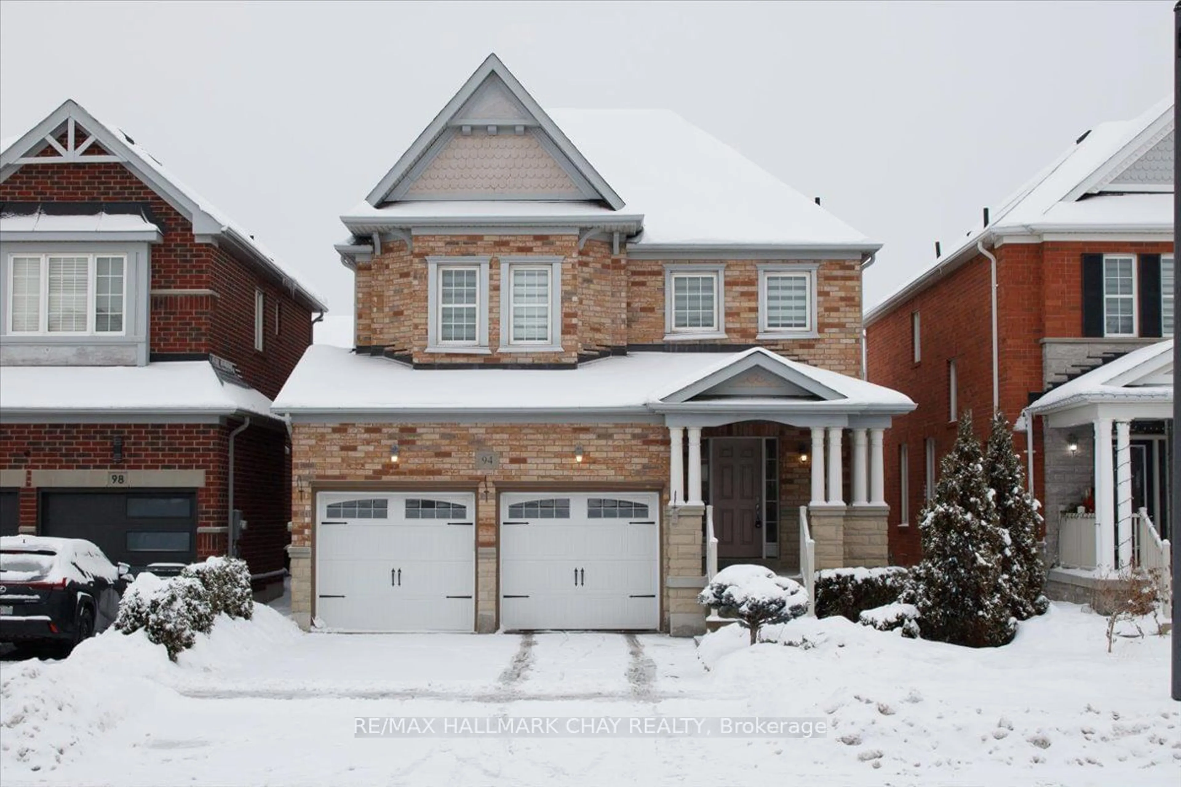 Home with brick exterior material, street for 94 Blue Dasher Blvd, Bradford West Gwillimbury Ontario L3Z 0E5