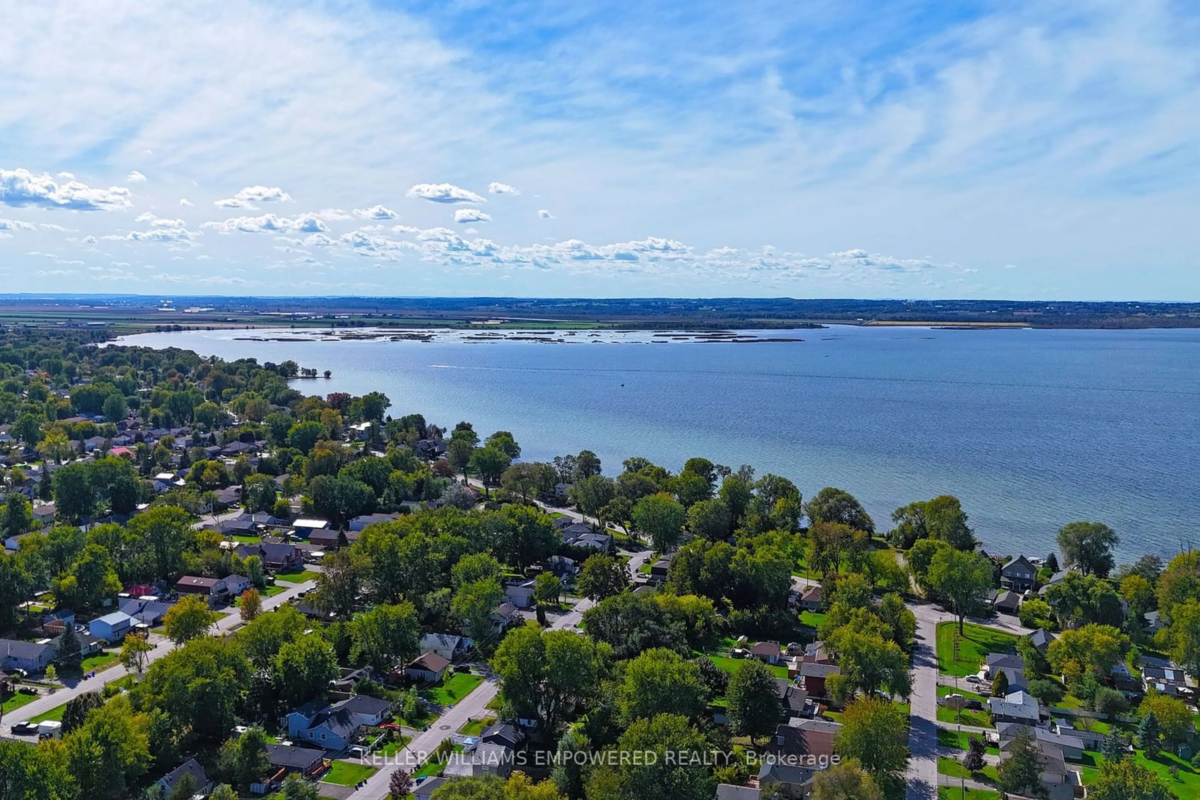 A pic from outside/outdoor area/front of a property/back of a property/a pic from drone, water/lake/river/ocean view for 229 Elm Ave, Georgina Ontario L4P 2V2