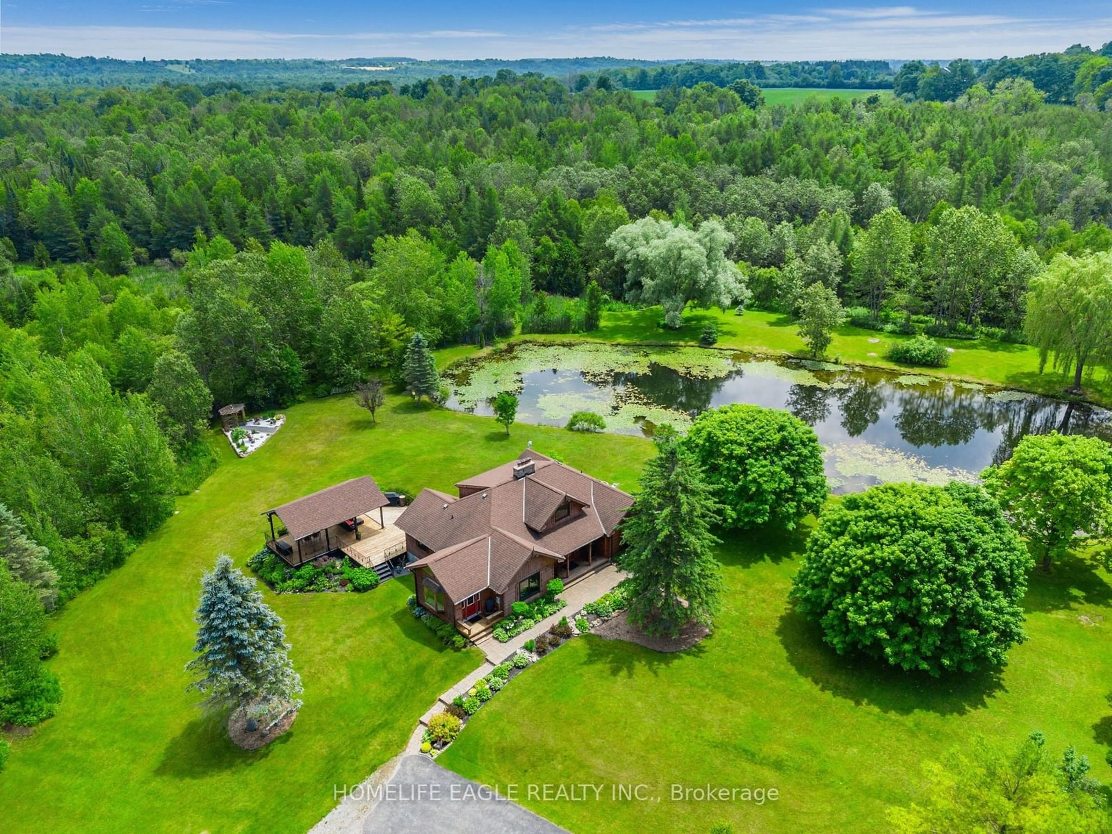 A pic from outside/outdoor area/front of a property/back of a property/a pic from drone, water/lake/river/ocean view for 13551 Concession 5 Rd, Uxbridge Ontario L9P 1R2