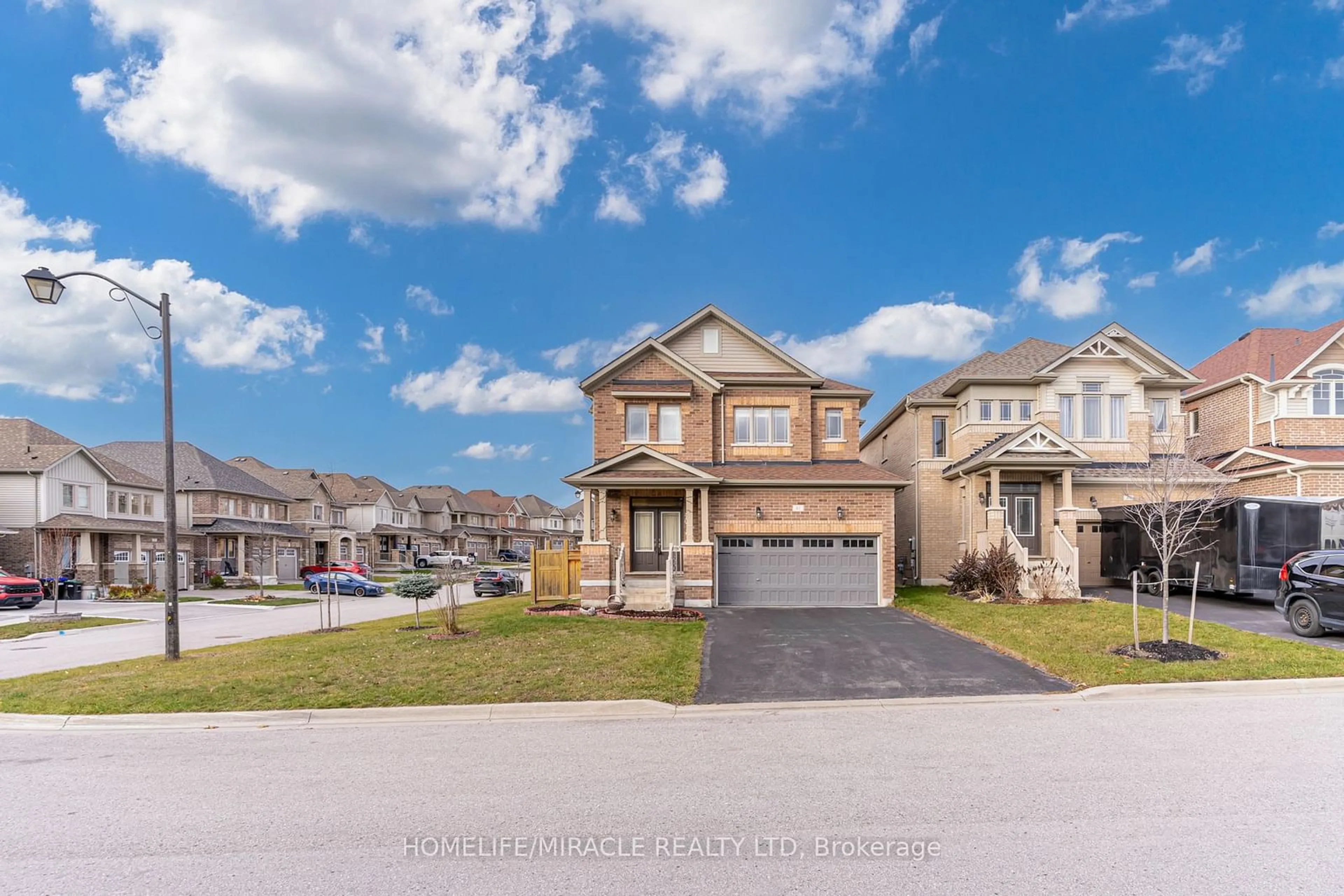 A pic from outside/outdoor area/front of a property/back of a property/a pic from drone, street for 41 Atkinson Cres, New Tecumseth Ontario L9R 0W8