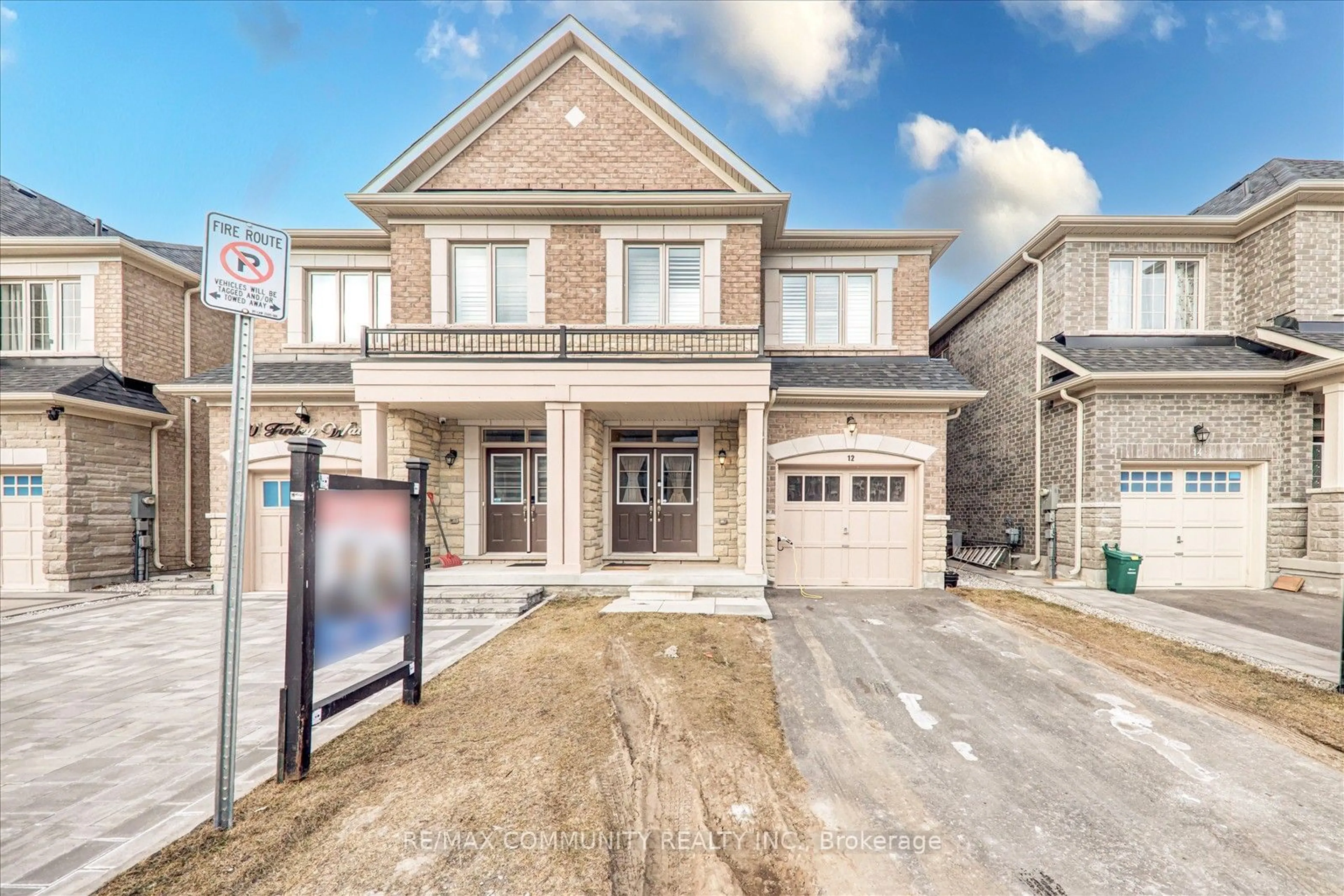 Home with brick exterior material, street for 12 Finley Way, Markham Ontario L3S 0E8