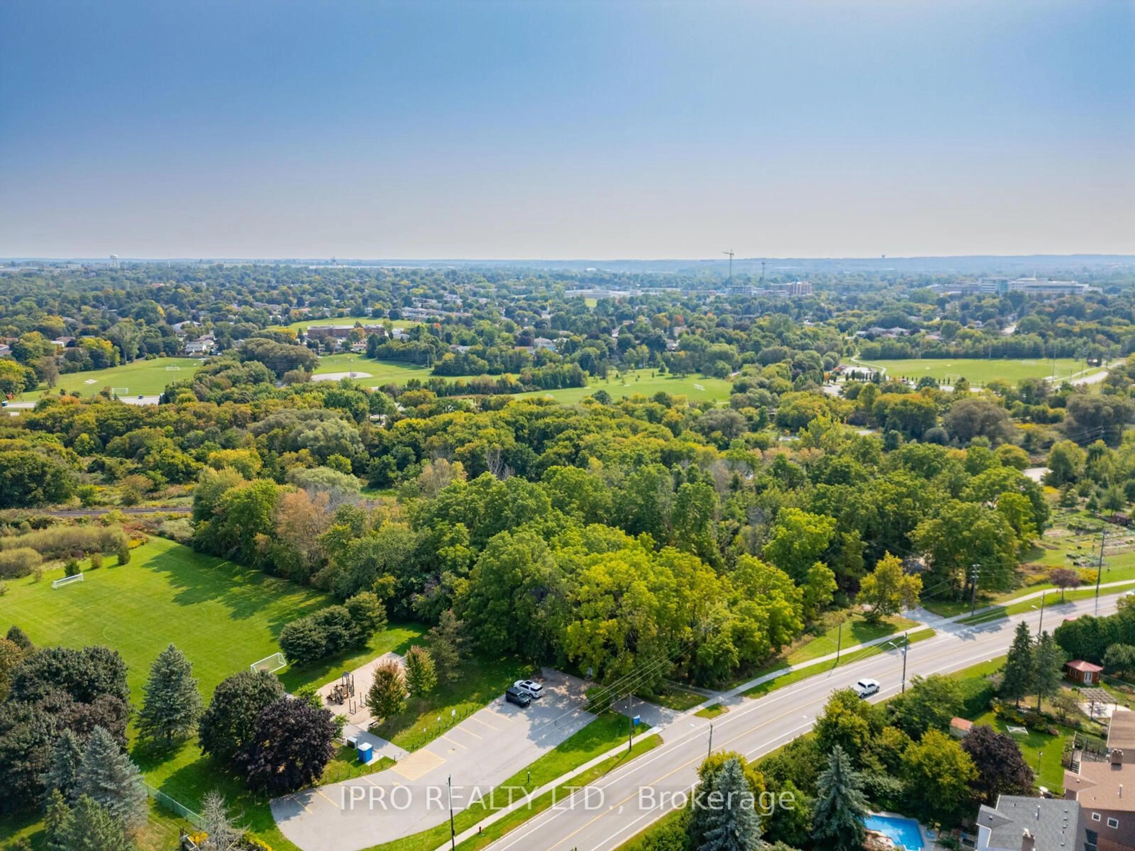 A pic from outside/outdoor area/front of a property/back of a property/a pic from drone, forest/trees view for 315 Main St, Newmarket Ontario L3Y 9A9