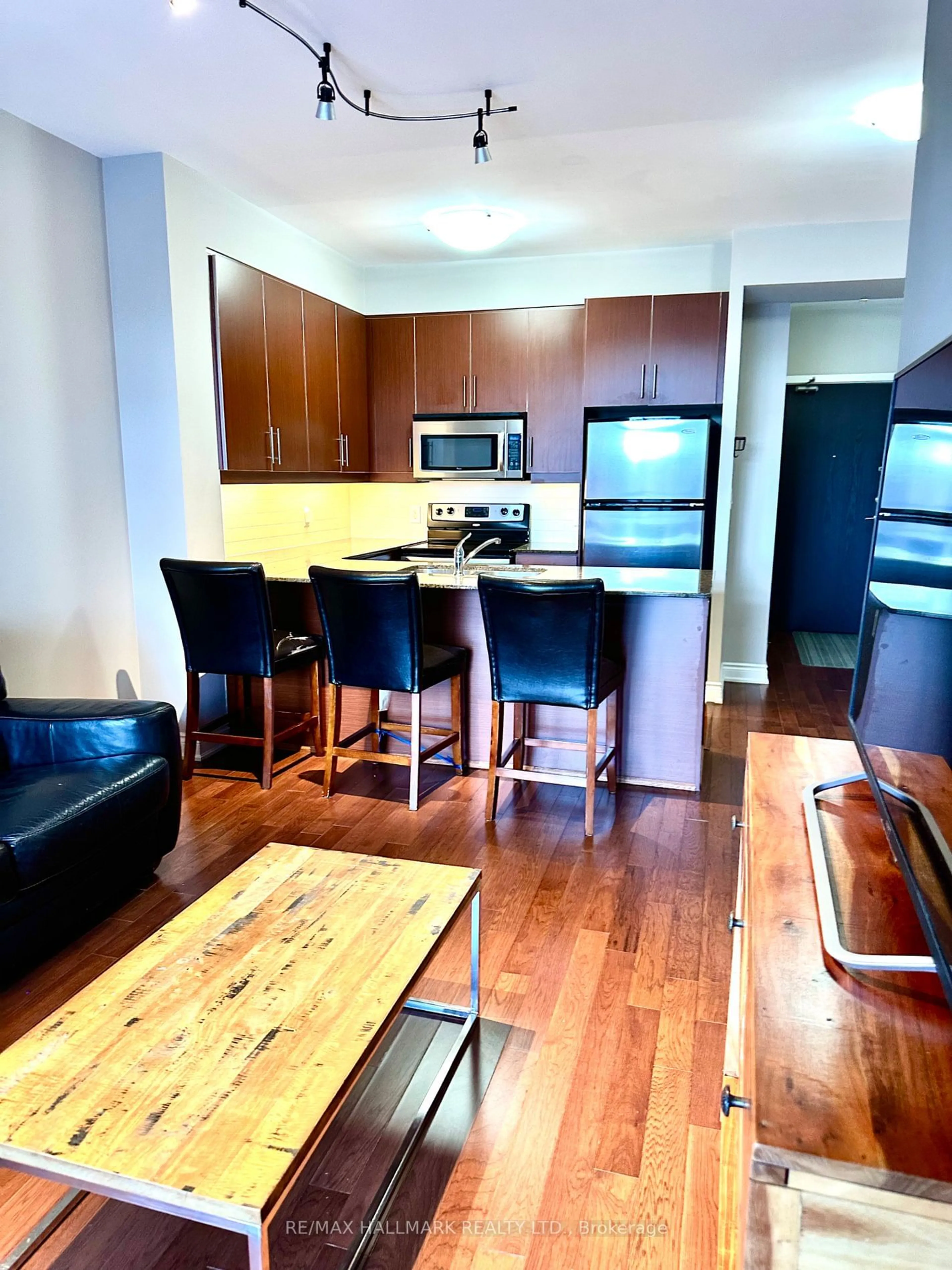 Open concept kitchen, wood/laminate floor for 281 Woodbridge Ave #410, Vaughan Ontario L4L 0C6