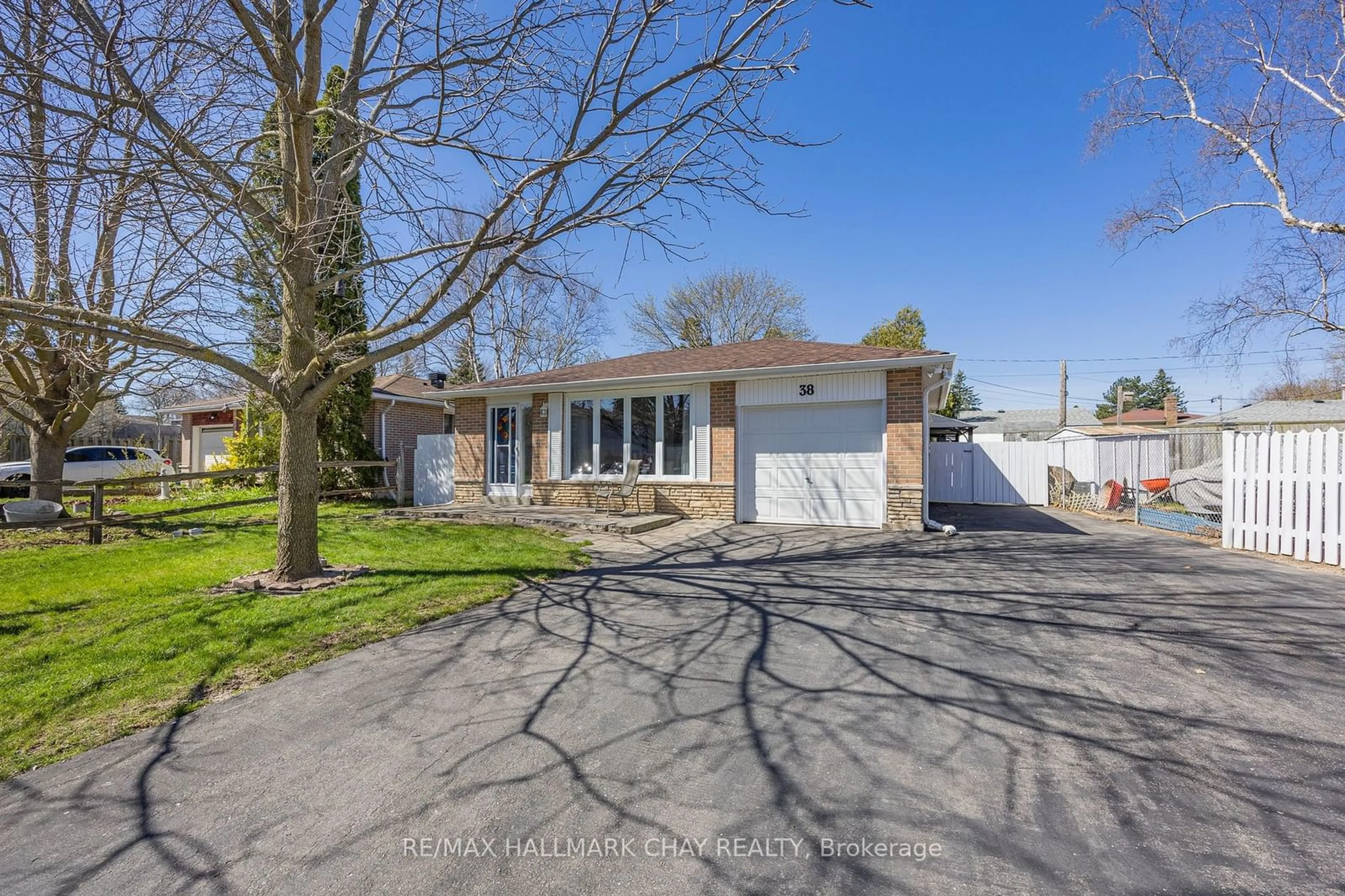 A pic from outside/outdoor area/front of a property/back of a property/a pic from drone, street for 38 Lionel Stone Ave, New Tecumseth Ontario L0G 1A0