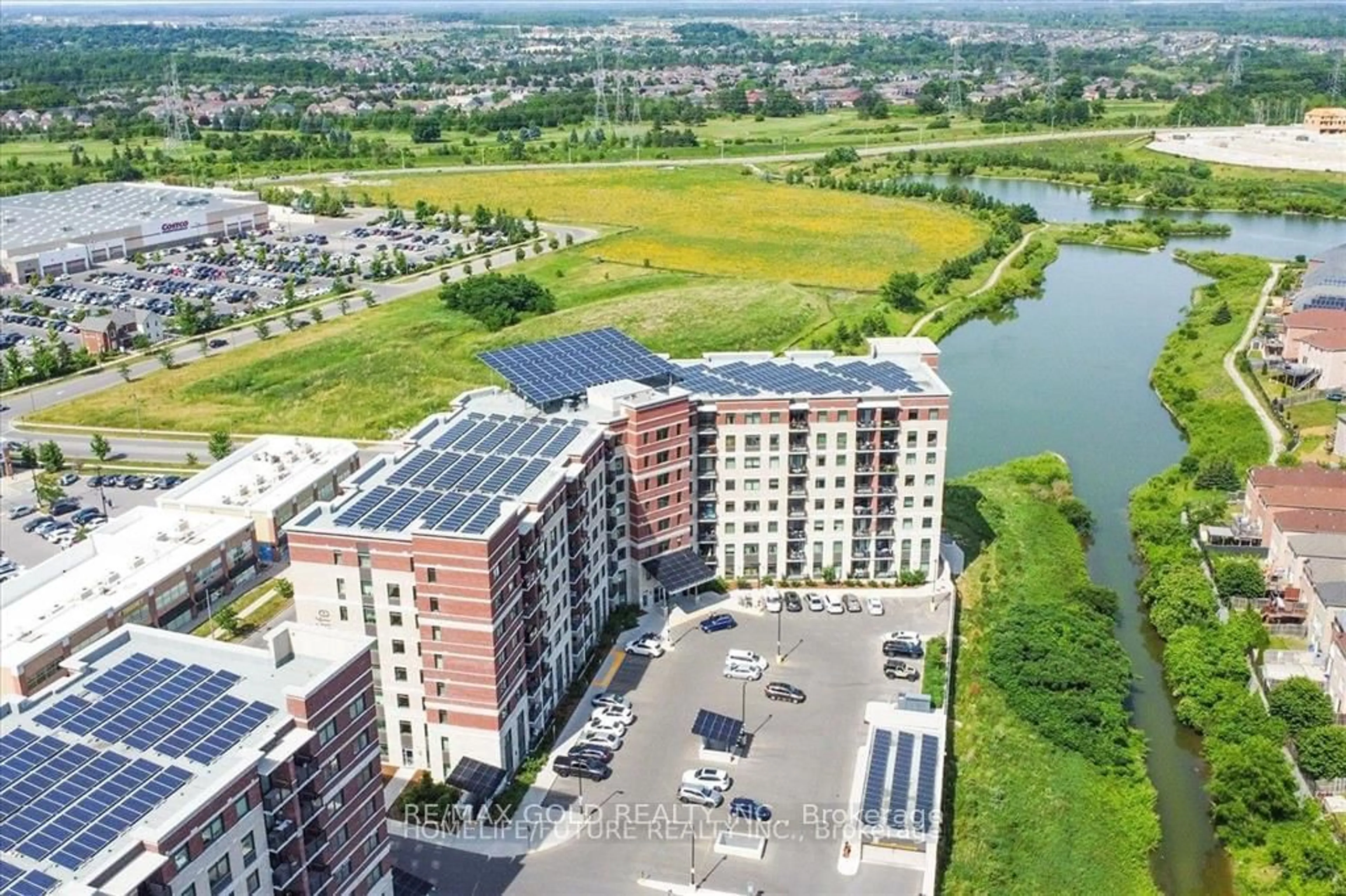 A pic from outside/outdoor area/front of a property/back of a property/a pic from drone, water/lake/river/ocean view for 39 New Delhi Dr #203, Markham Ontario L3S 0E1