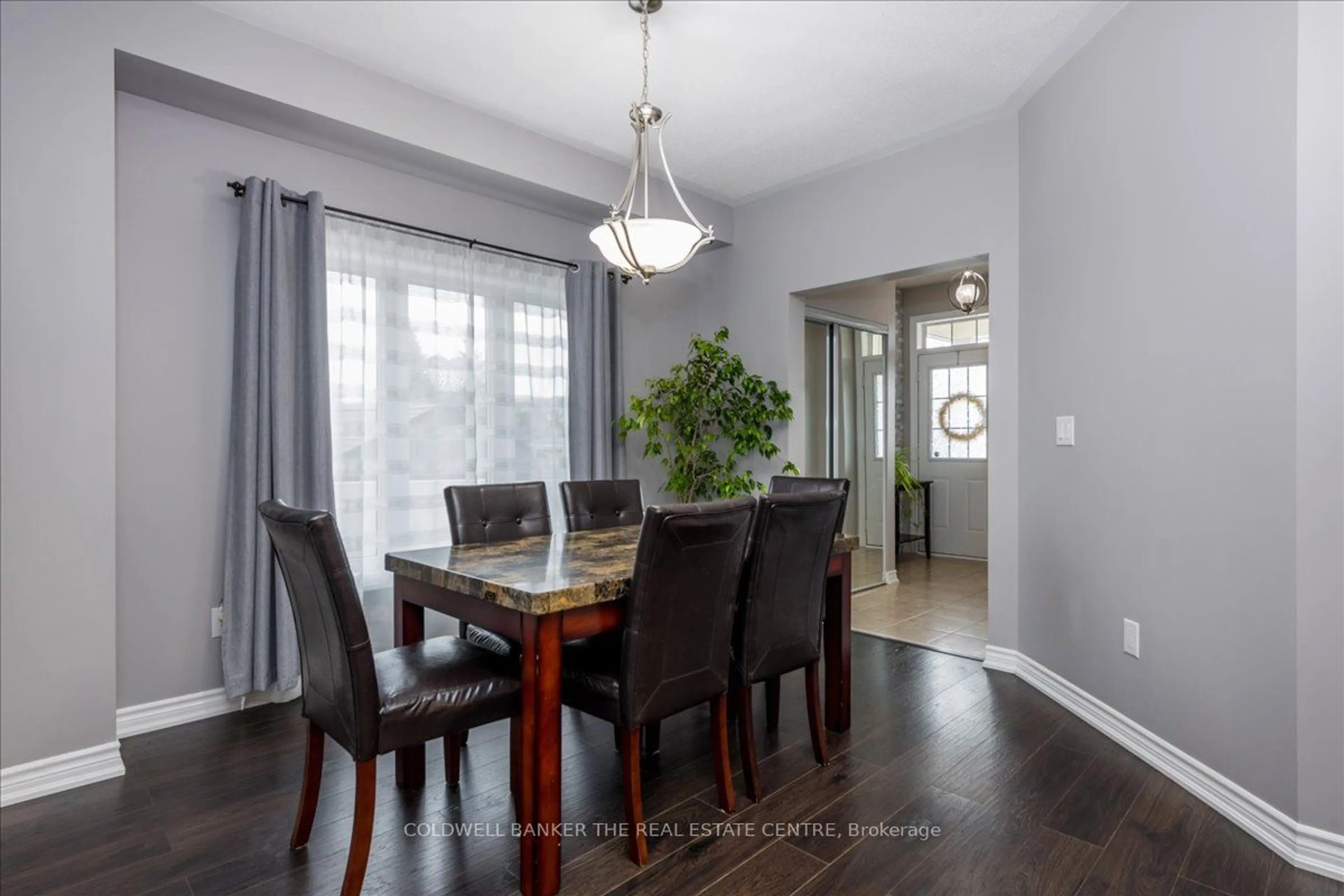 Dining room, wood/laminate floor for 290 Greenwood Dr, Essa Ontario L0M 1B4