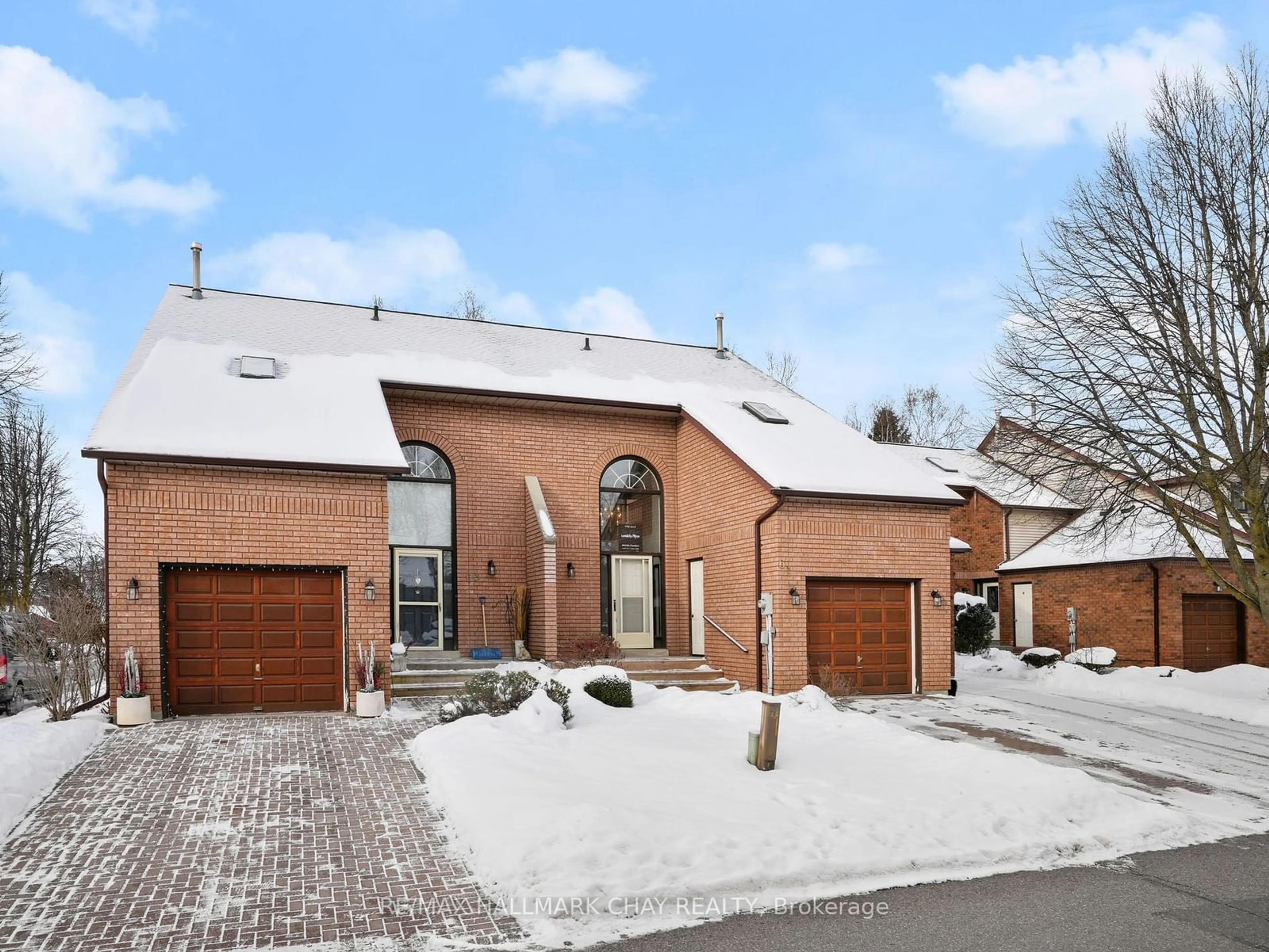 Home with brick exterior material, street for 61 Green Briar Rd, New Tecumseth Ontario L9R 1R6