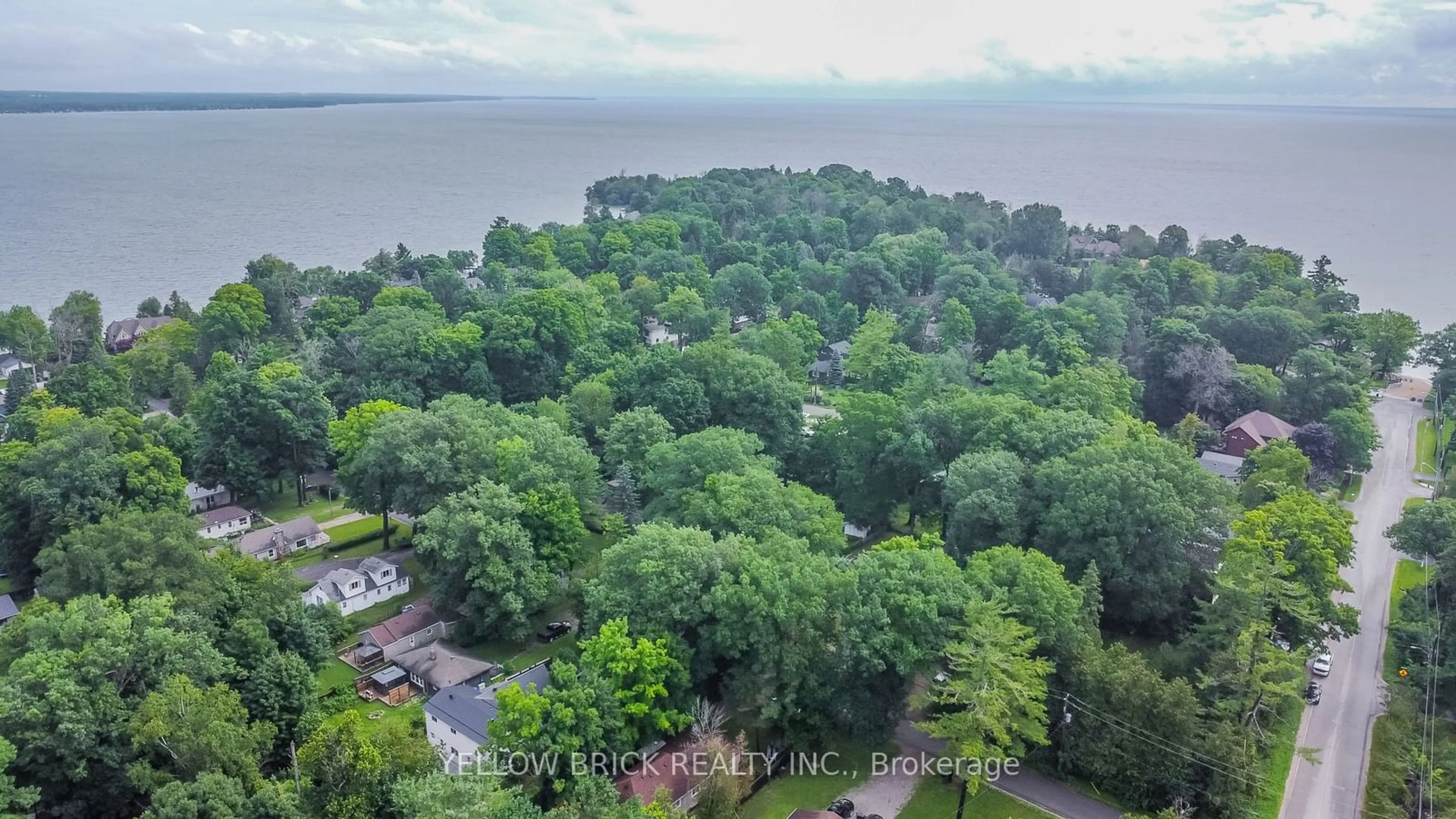 A pic from outside/outdoor area/front of a property/back of a property/a pic from drone, water/lake/river/ocean view for 3923 Algonquin Ave, Innisfil Ontario L9S 2M3