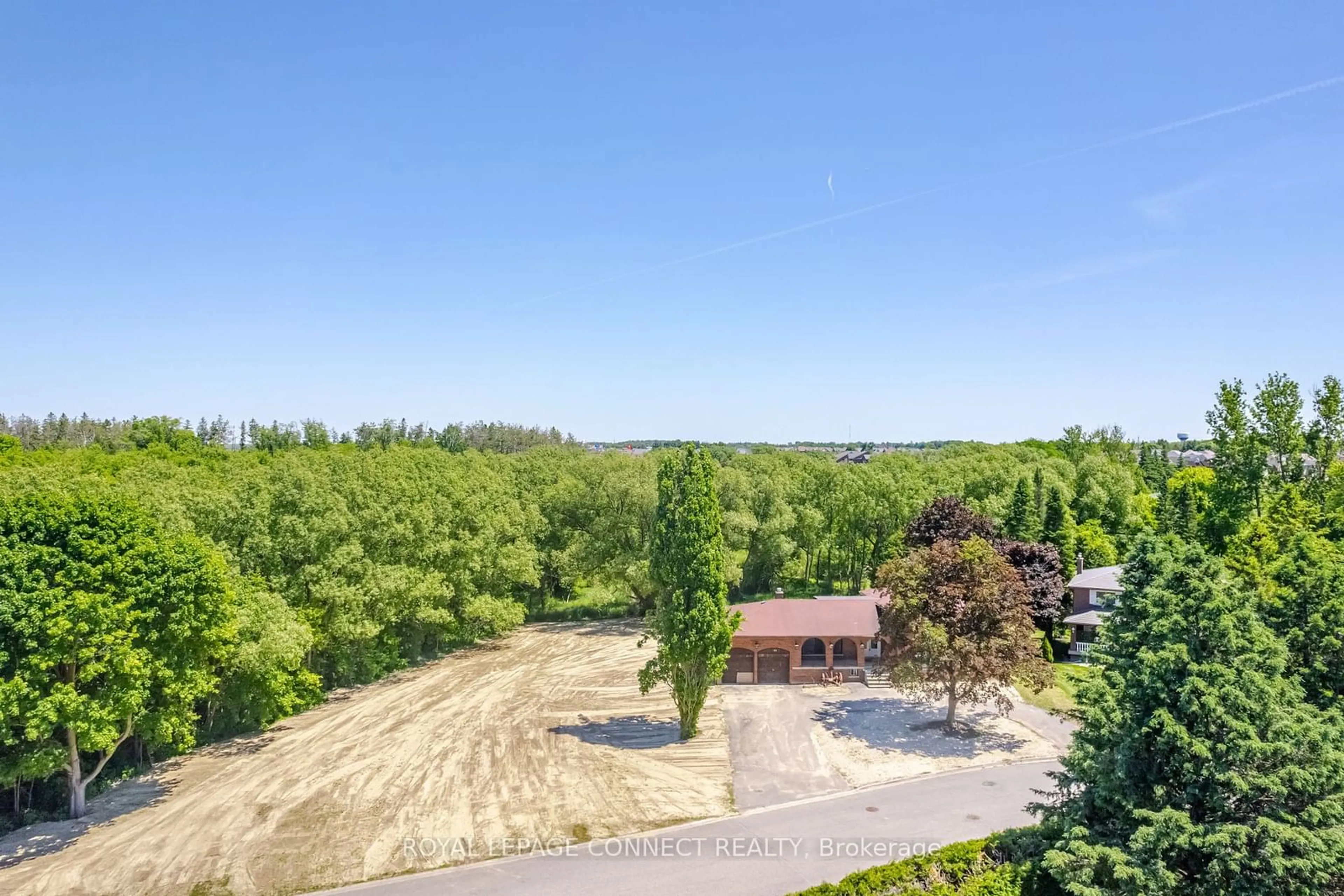 A pic from outside/outdoor area/front of a property/back of a property/a pic from drone, forest/trees view for 155 Dennison St, King Ontario L7B 1B8