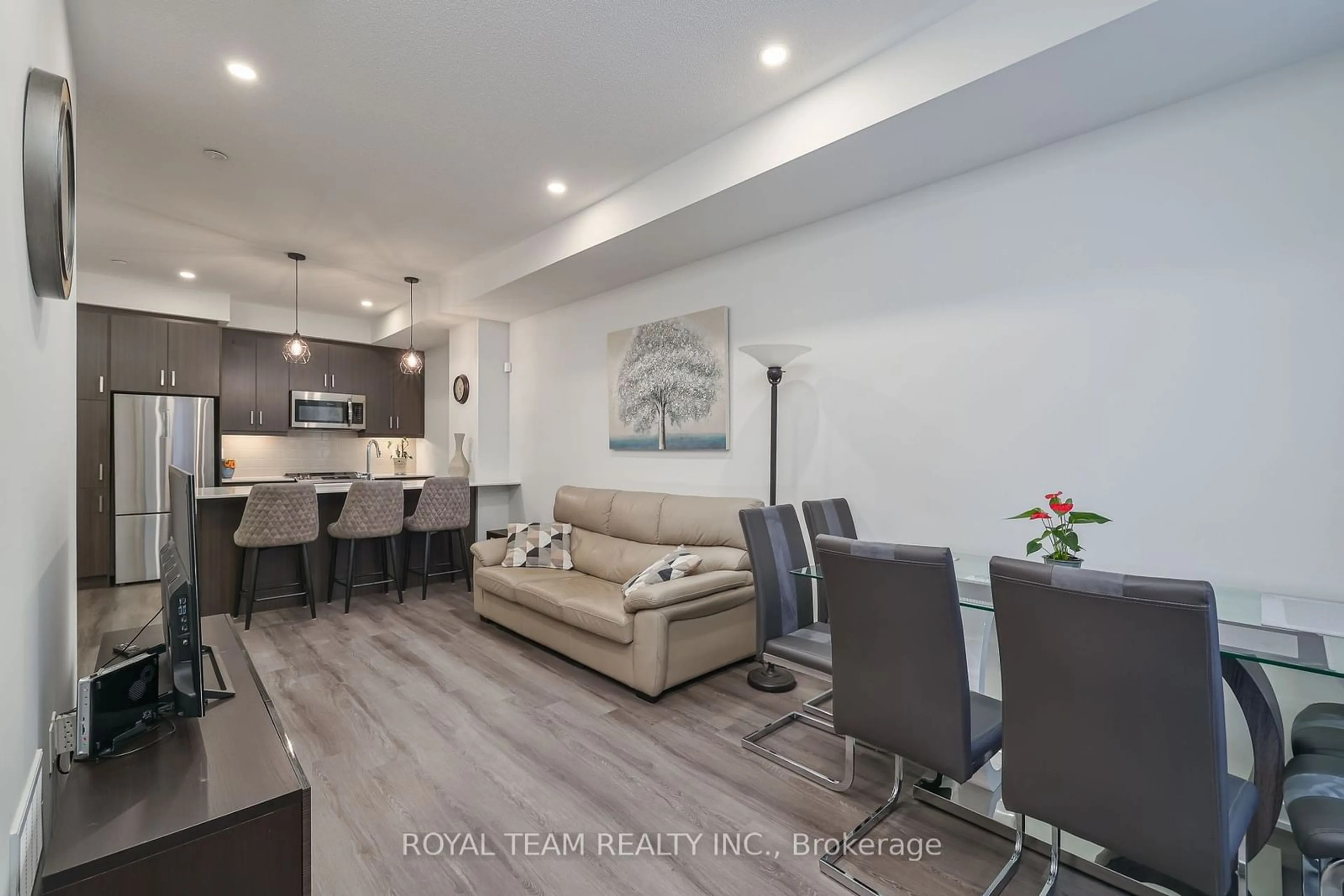 Living room with furniture, wood/laminate floor for 131 Honeycrisp Cres #224, Vaughan Ontario L4K 0N7