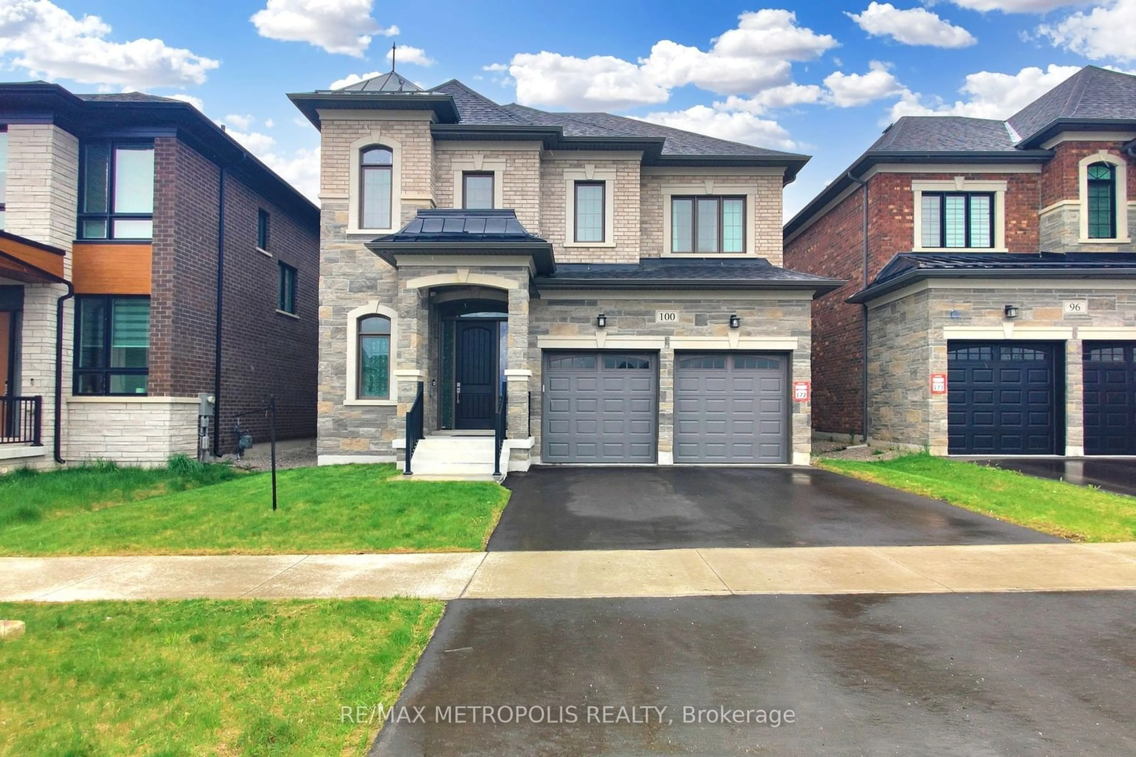 Home with brick exterior material, street for 100 Ballantyne Blvd, Vaughan Ontario L3L 0E8