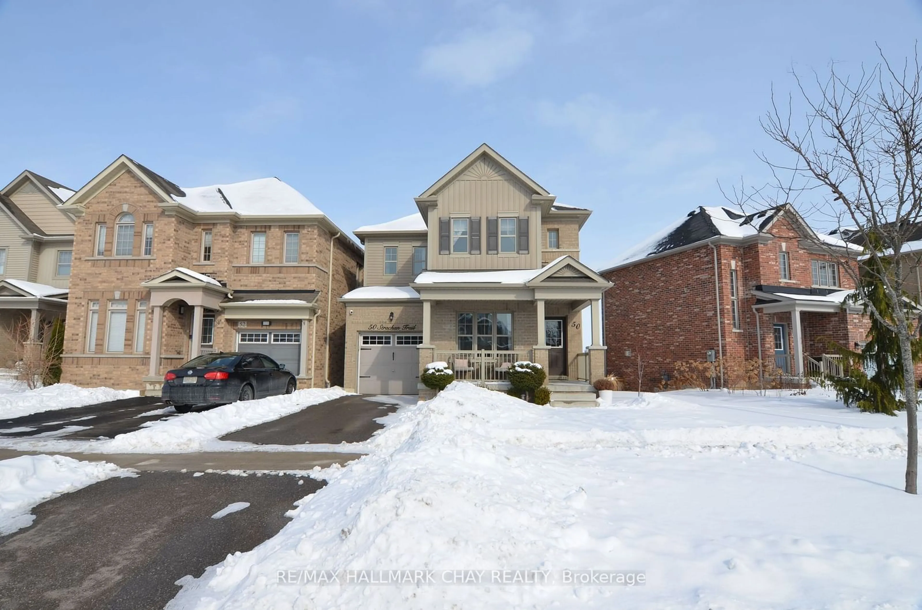 Home with brick exterior material, street for 50 Strachan Tr, New Tecumseth Ontario L0G 1A0