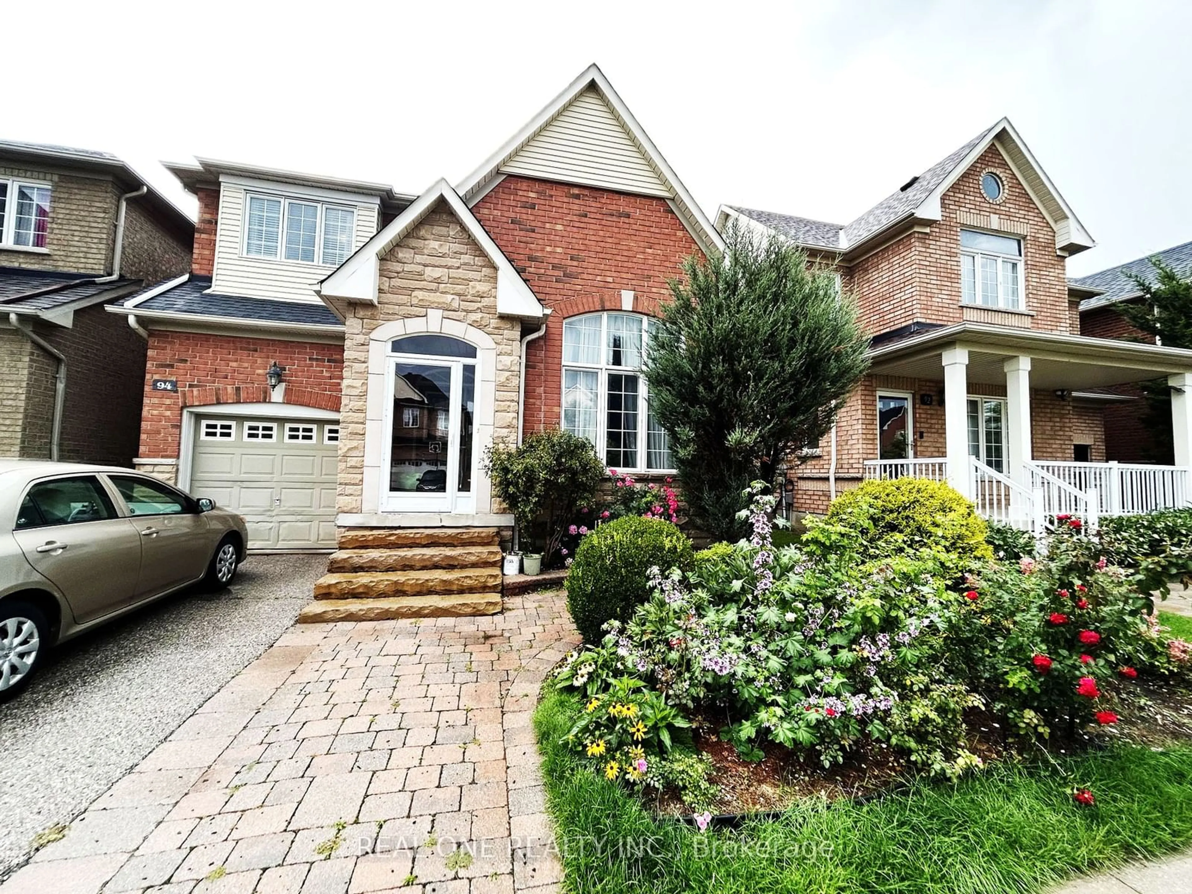 Home with brick exterior material, street for 94 Barnwood Dr, Richmond Hill Ontario L4E 5A2