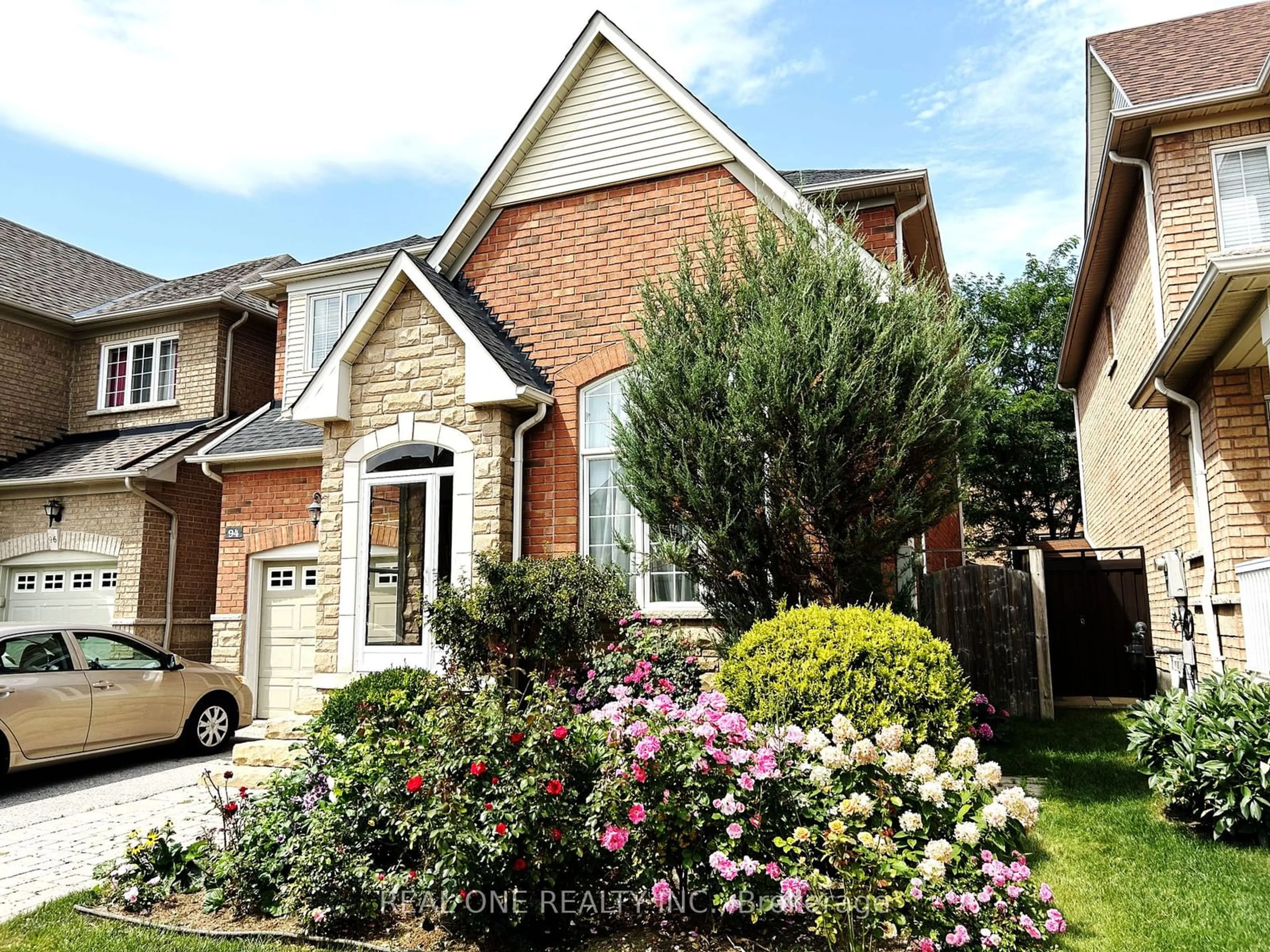 Home with brick exterior material, street for 94 Barnwood Dr, Richmond Hill Ontario L4E 5A2