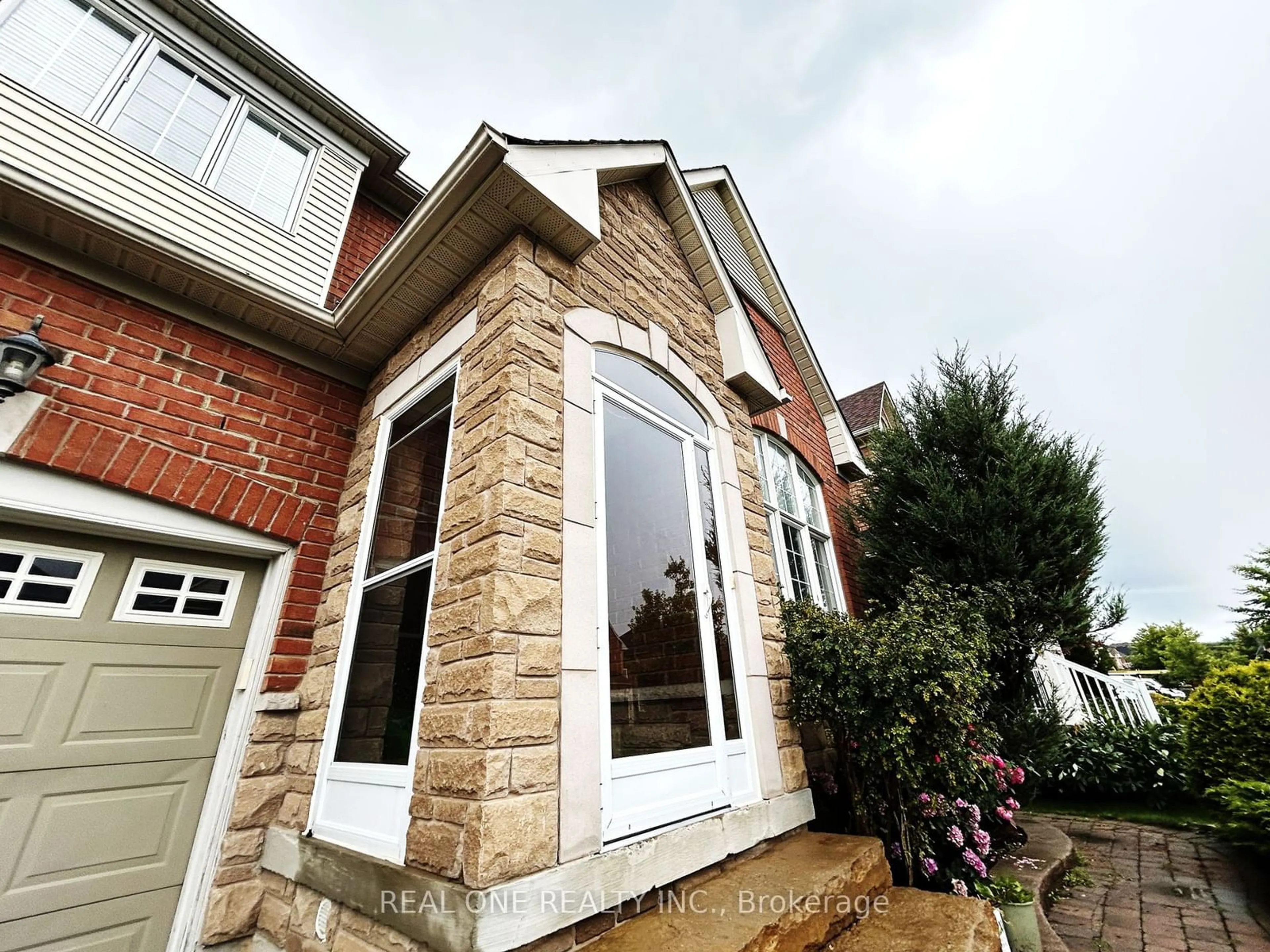 Home with brick exterior material, street for 94 Barnwood Dr, Richmond Hill Ontario L4E 5A2