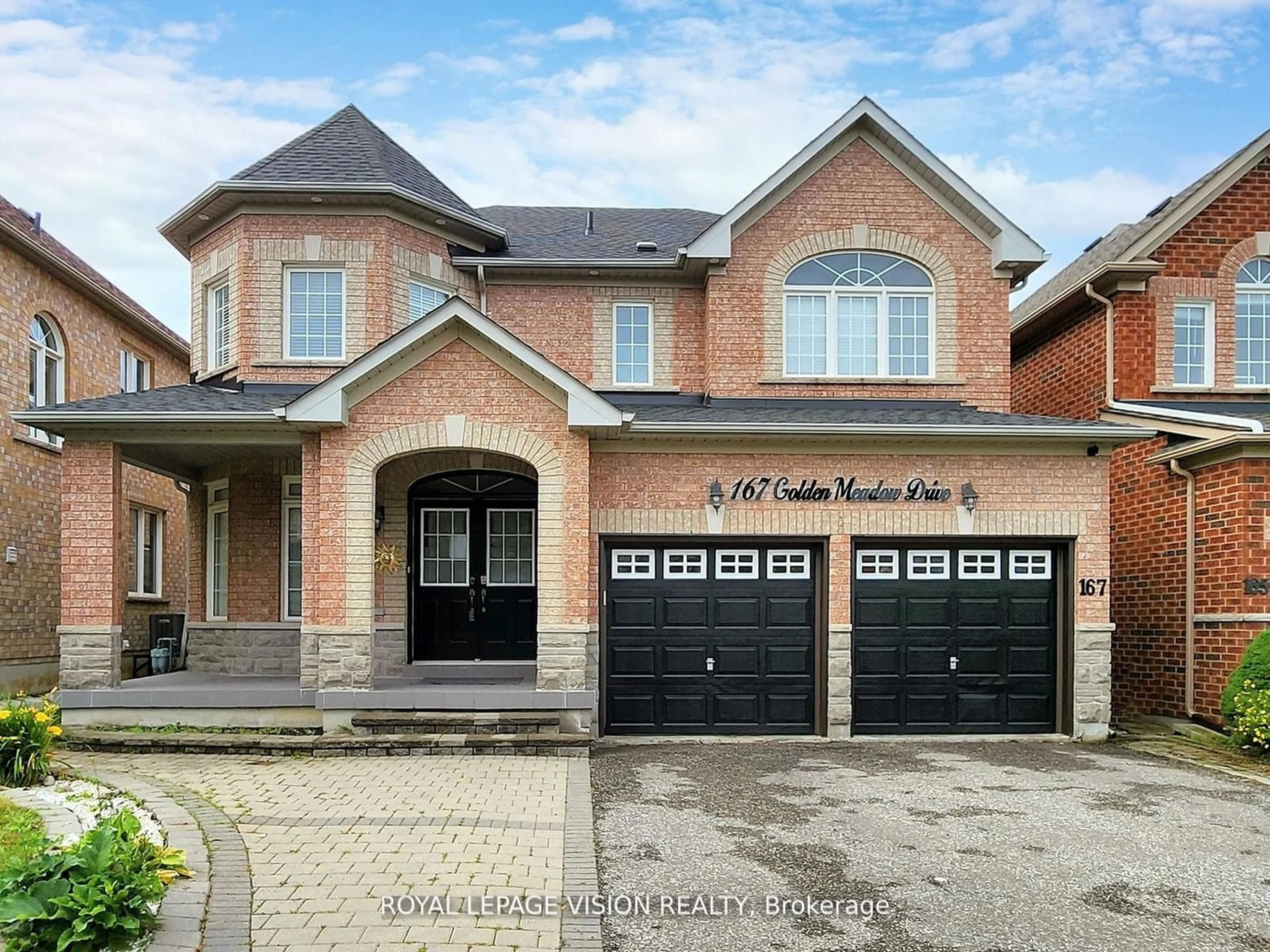 Home with brick exterior material, street for 167 Golden Meadow Dr, Markham Ontario L6E 1E2